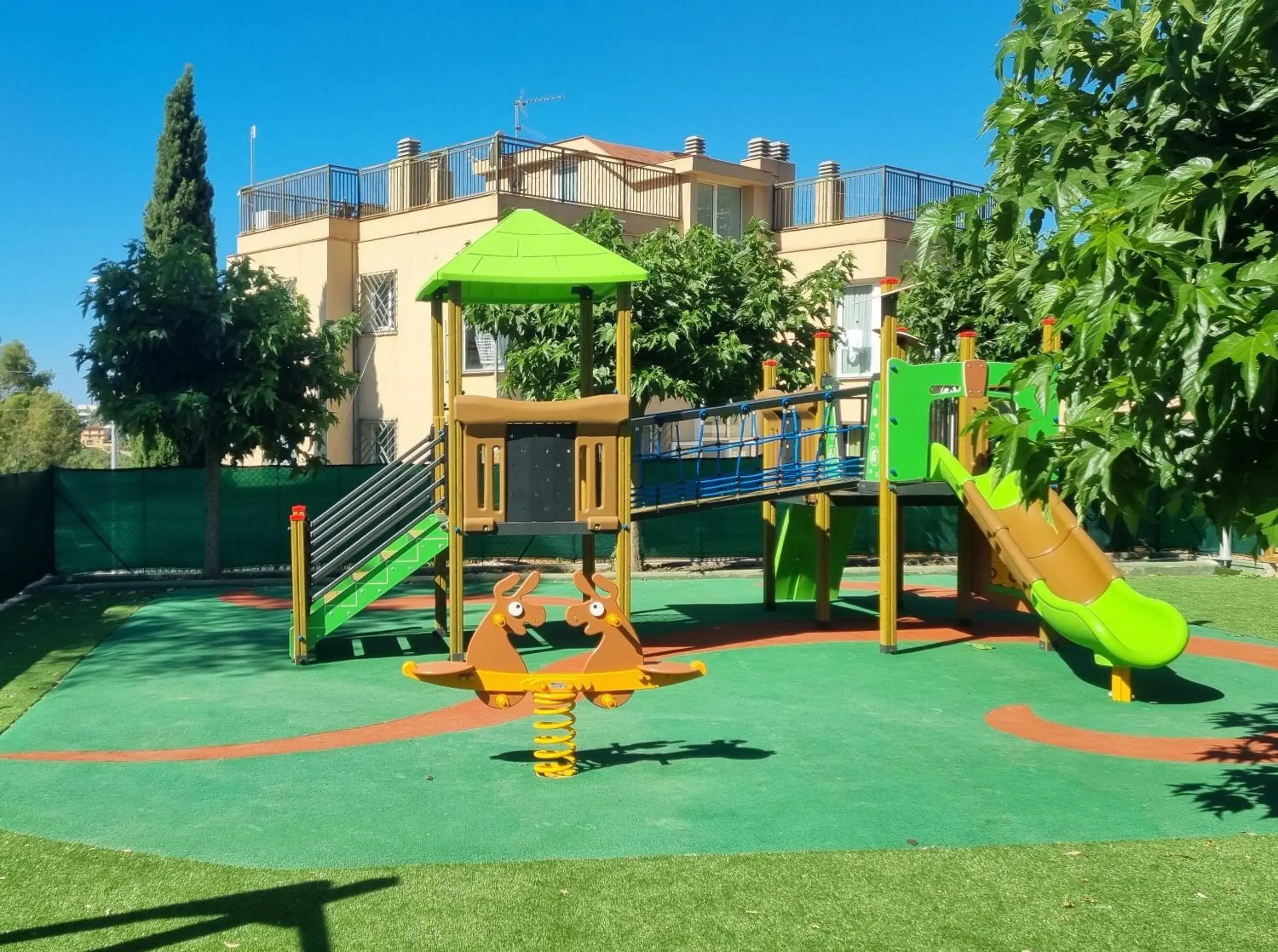 Property building, Children's Play Area in Apartaments Els Llorers