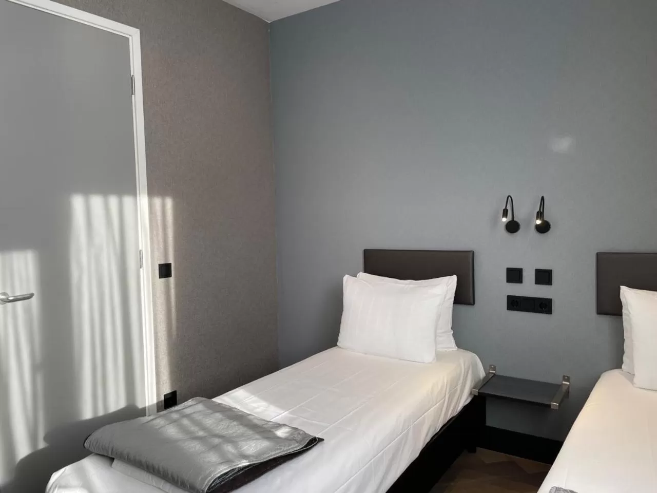 Bed in H3 Hotel Rotterdam City Center