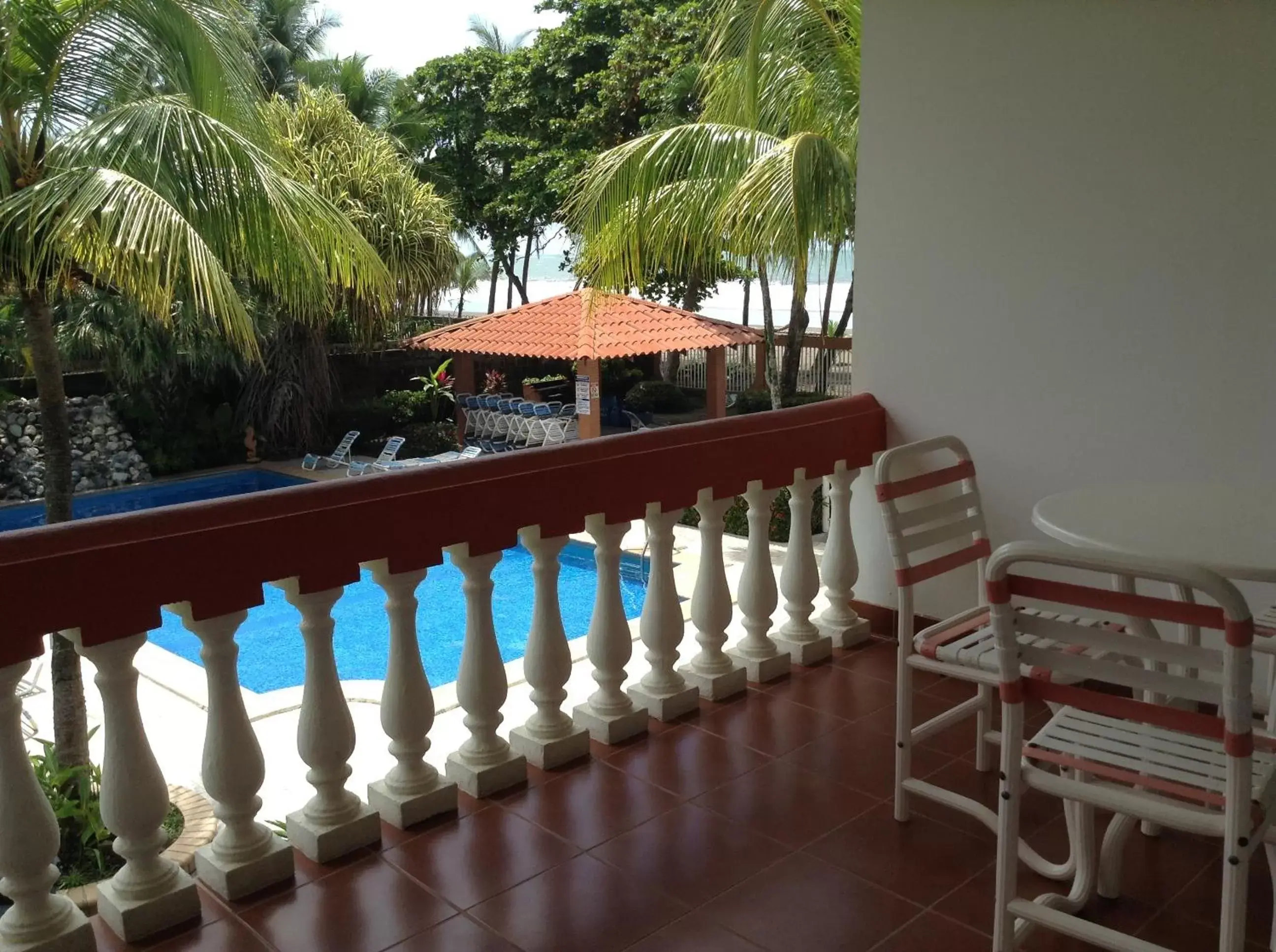 Balcony/Terrace, Pool View in Apartotel Flamboyant