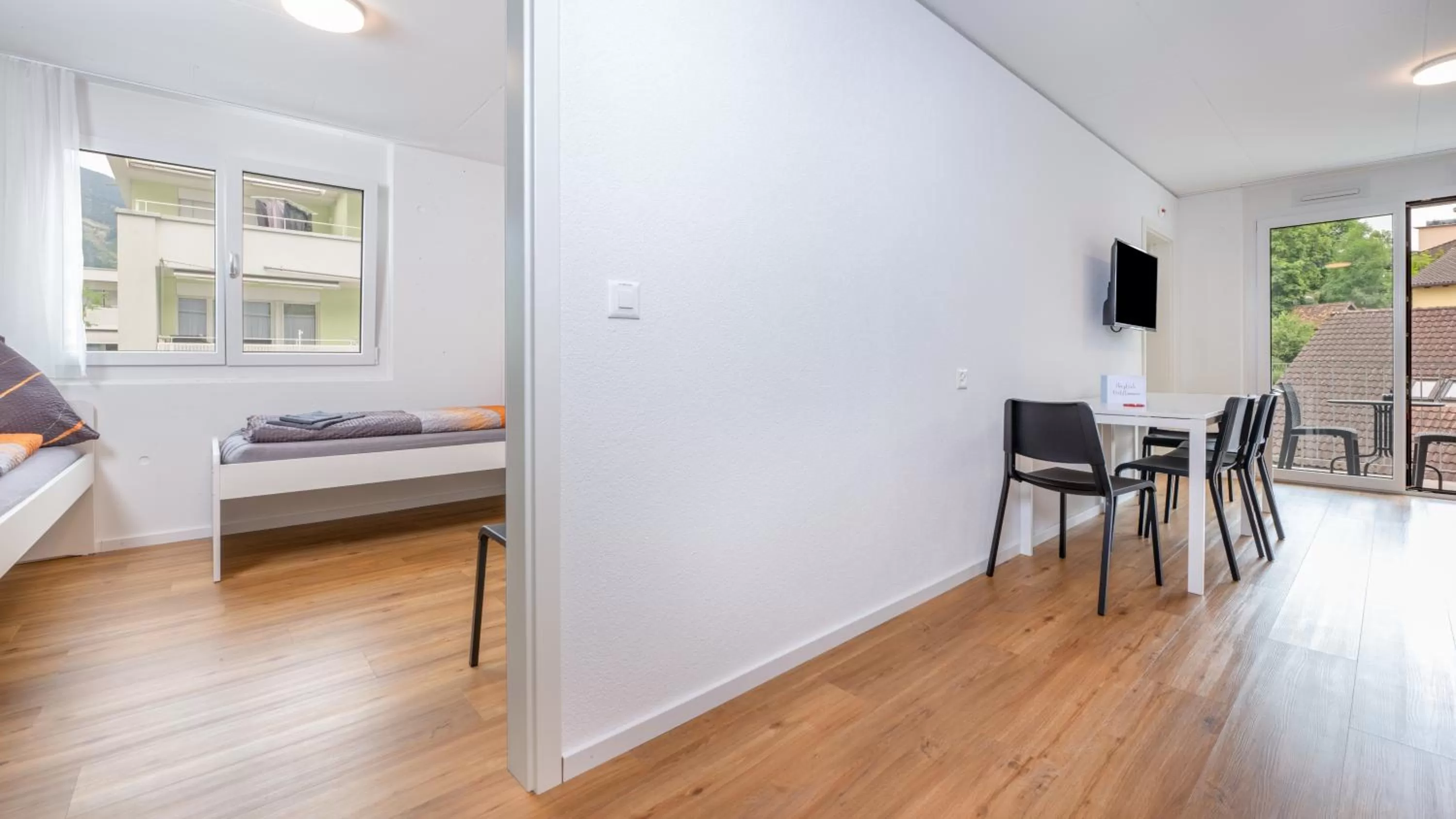 Dining area, Bed in Anstatthotel Goldau - self-check-in
