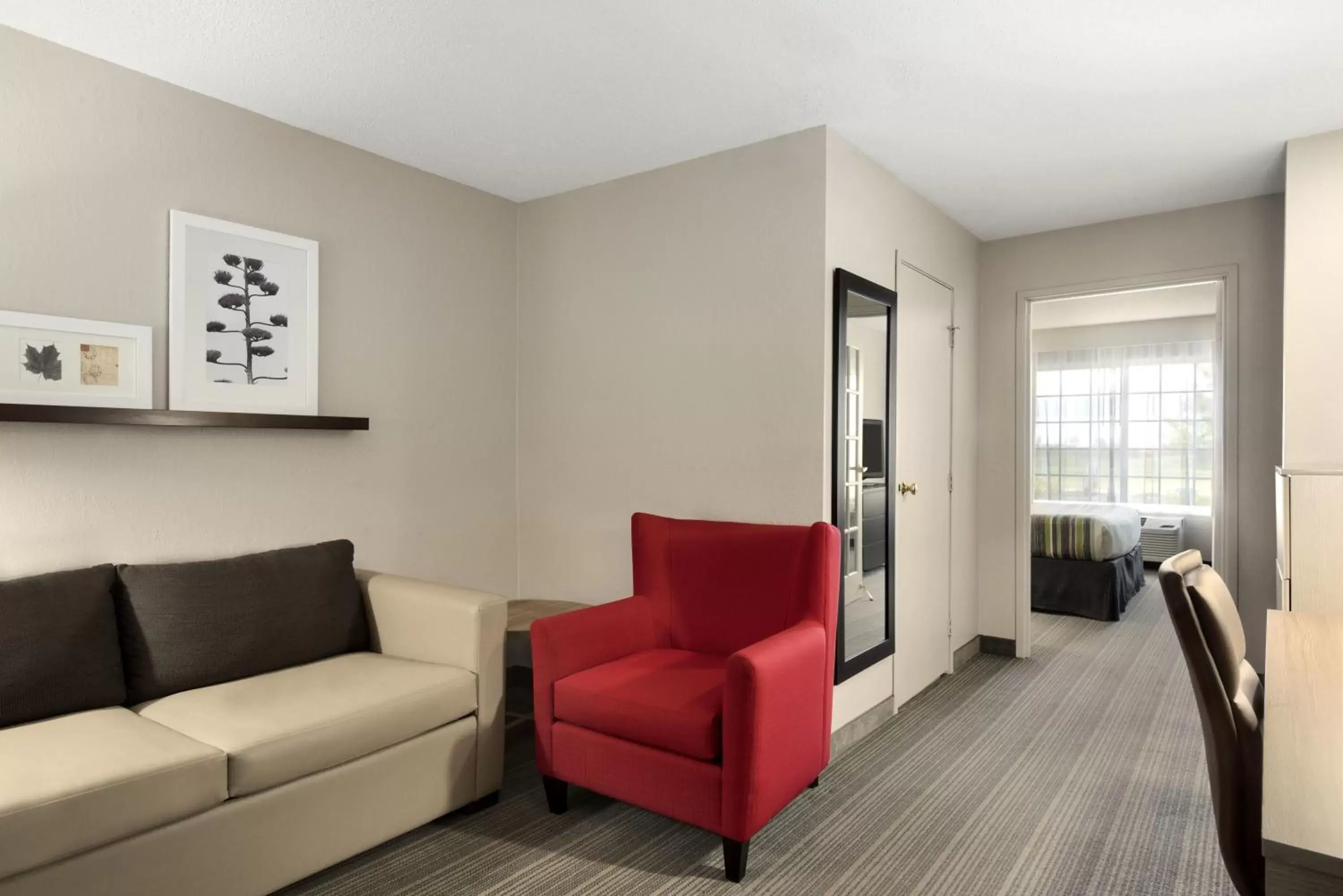 Living room, Seating Area in Country Inn & Suites by Radisson, Romeoville, IL