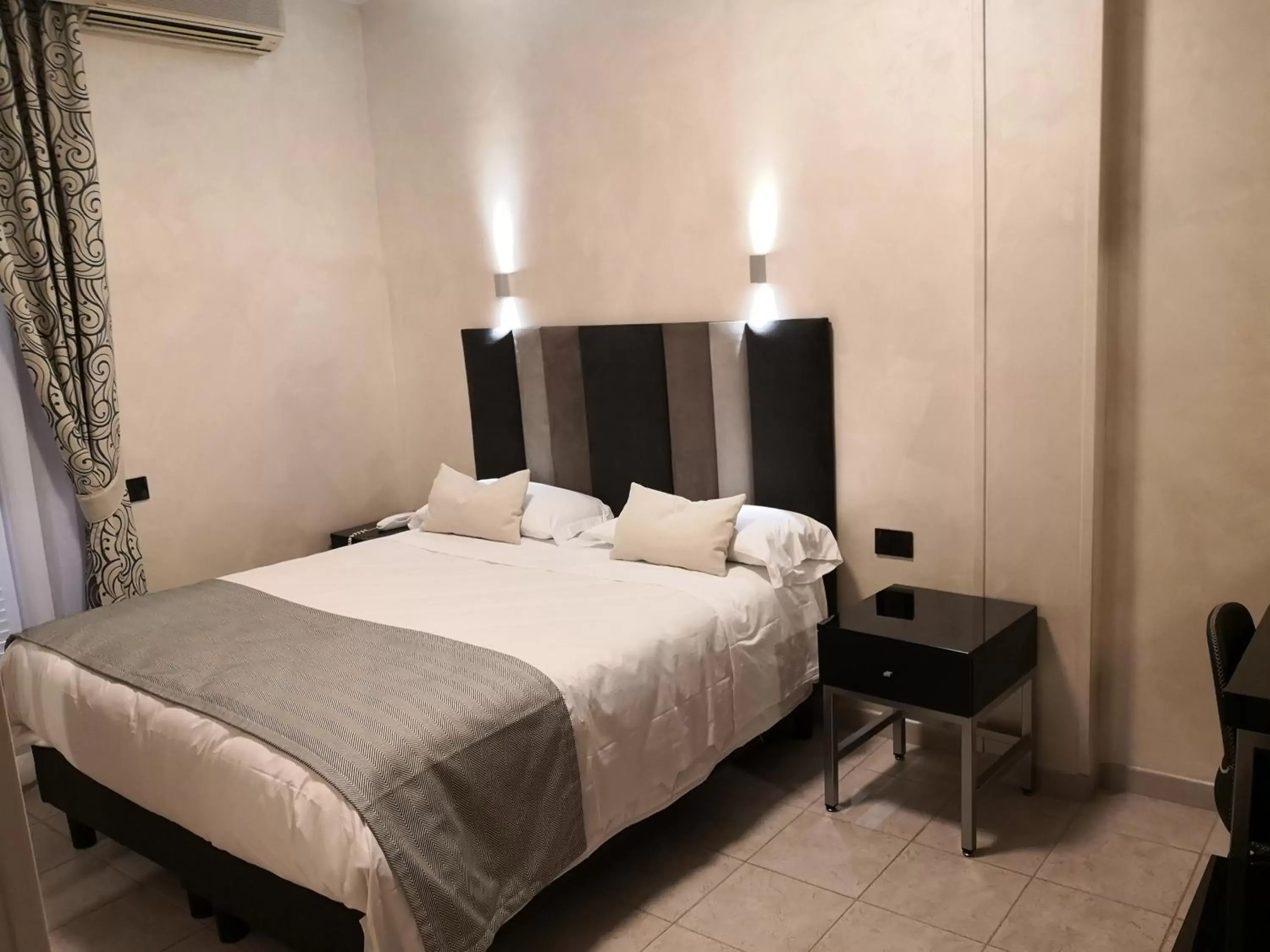 Bed in Hotel Rimini