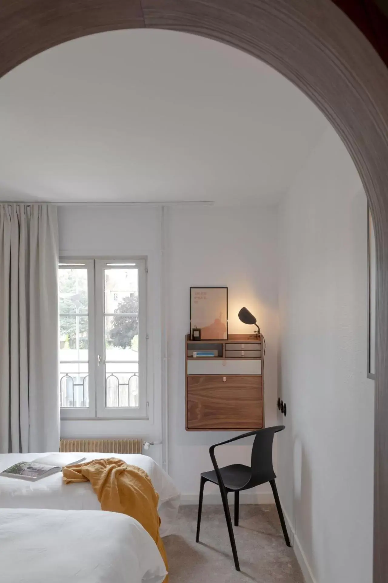 Bedroom in Hôtel Le Prieuré