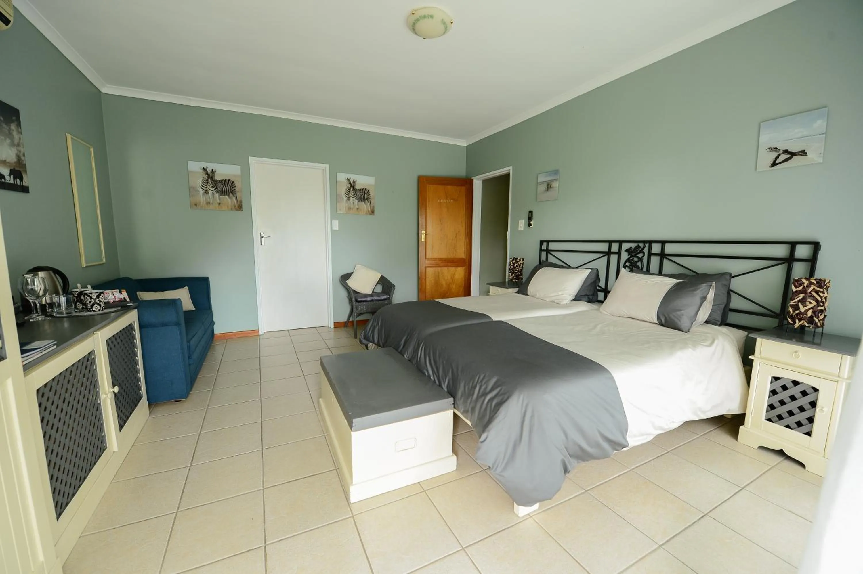 Bed in De Wingerd Wijnland Lodge