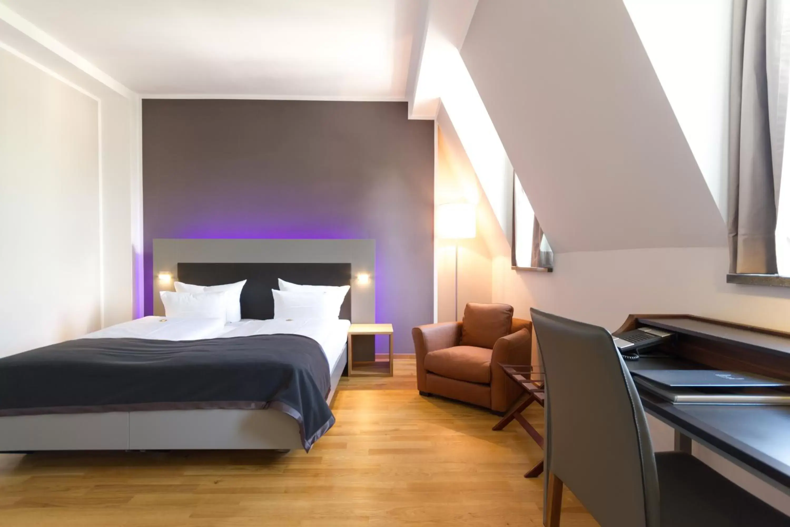 Photo of the whole room, Bed in Qube Hotel Bergheim