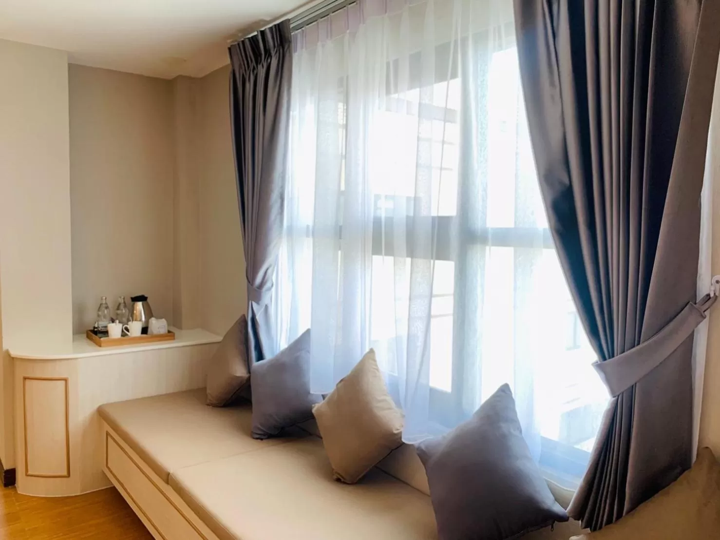 Bed in De Hug Hotel & Residence