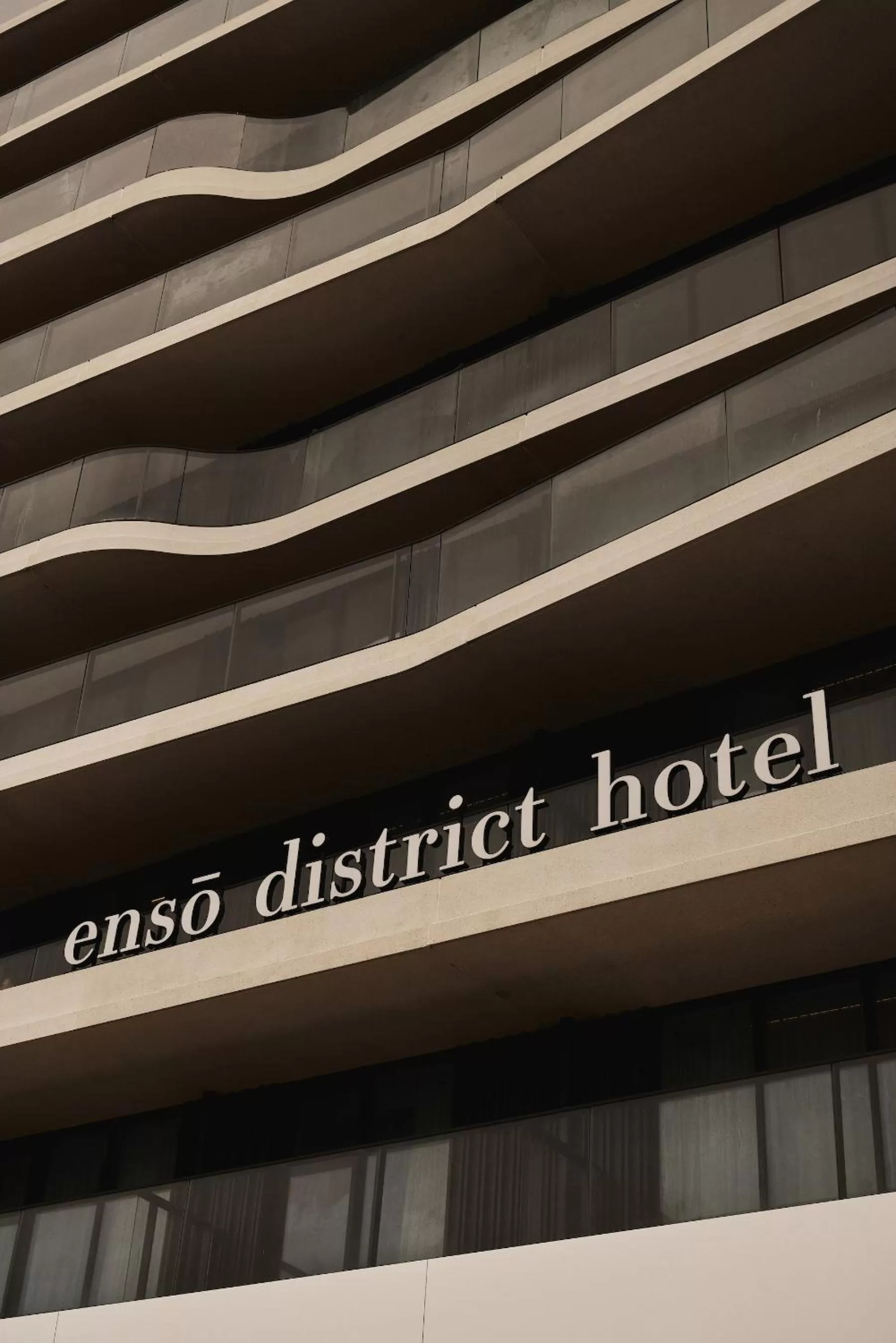 Property building, Property Logo/Sign in Enso District Hotel