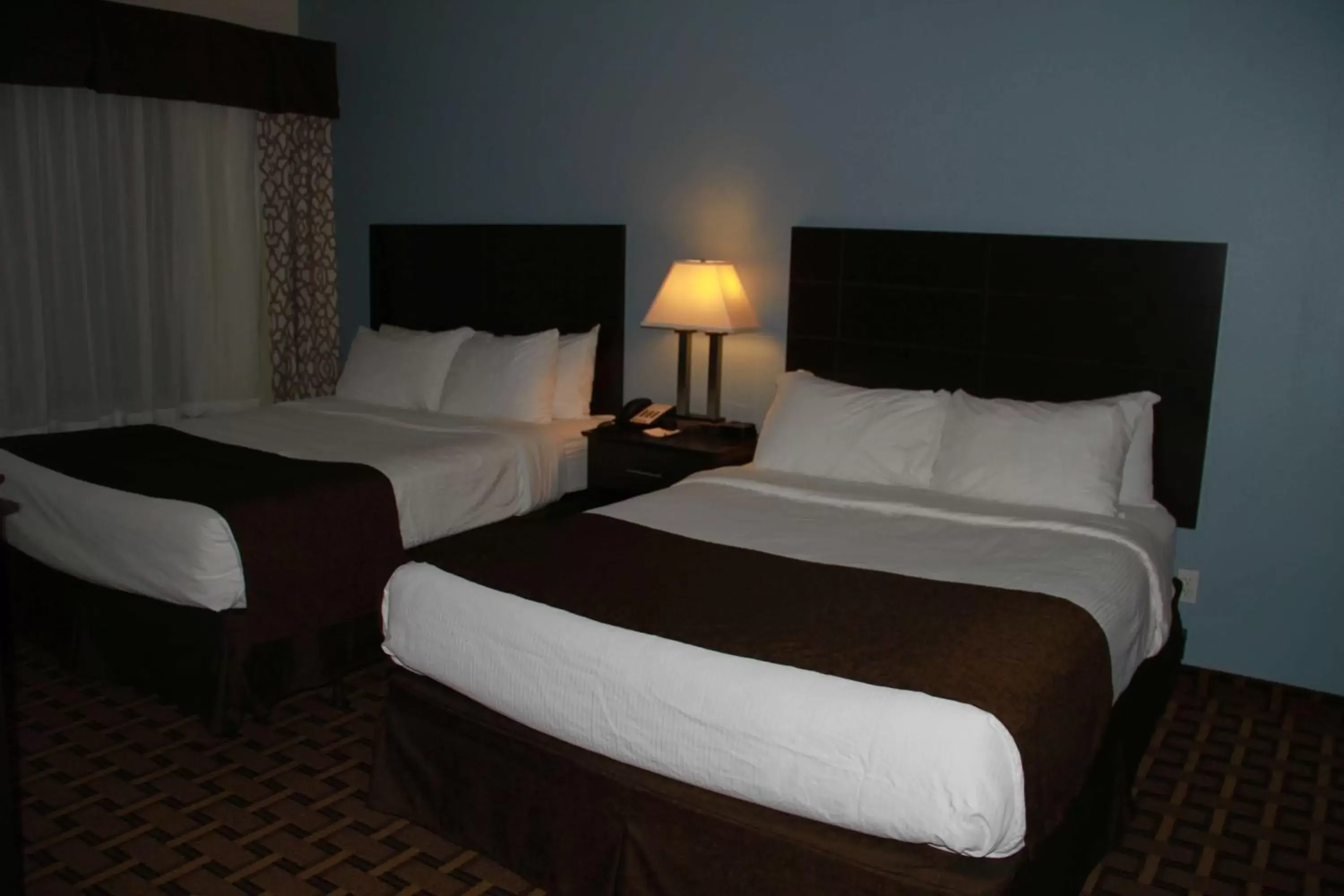 Photo of the whole room, Bed in SureStay Plus Hotel by Best Western Coralville Iowa City