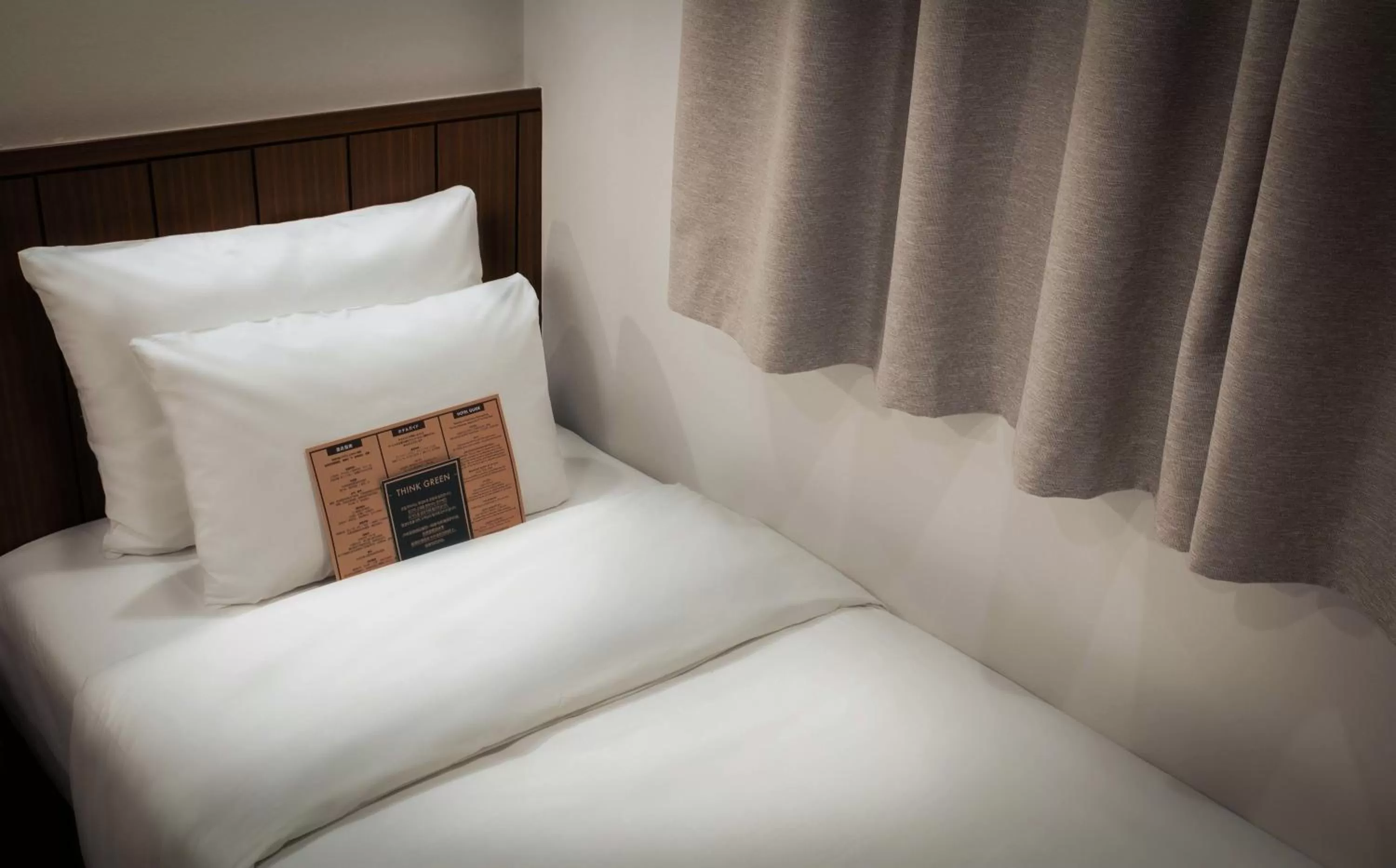 Bed in Hotel Lumia Myeongdong