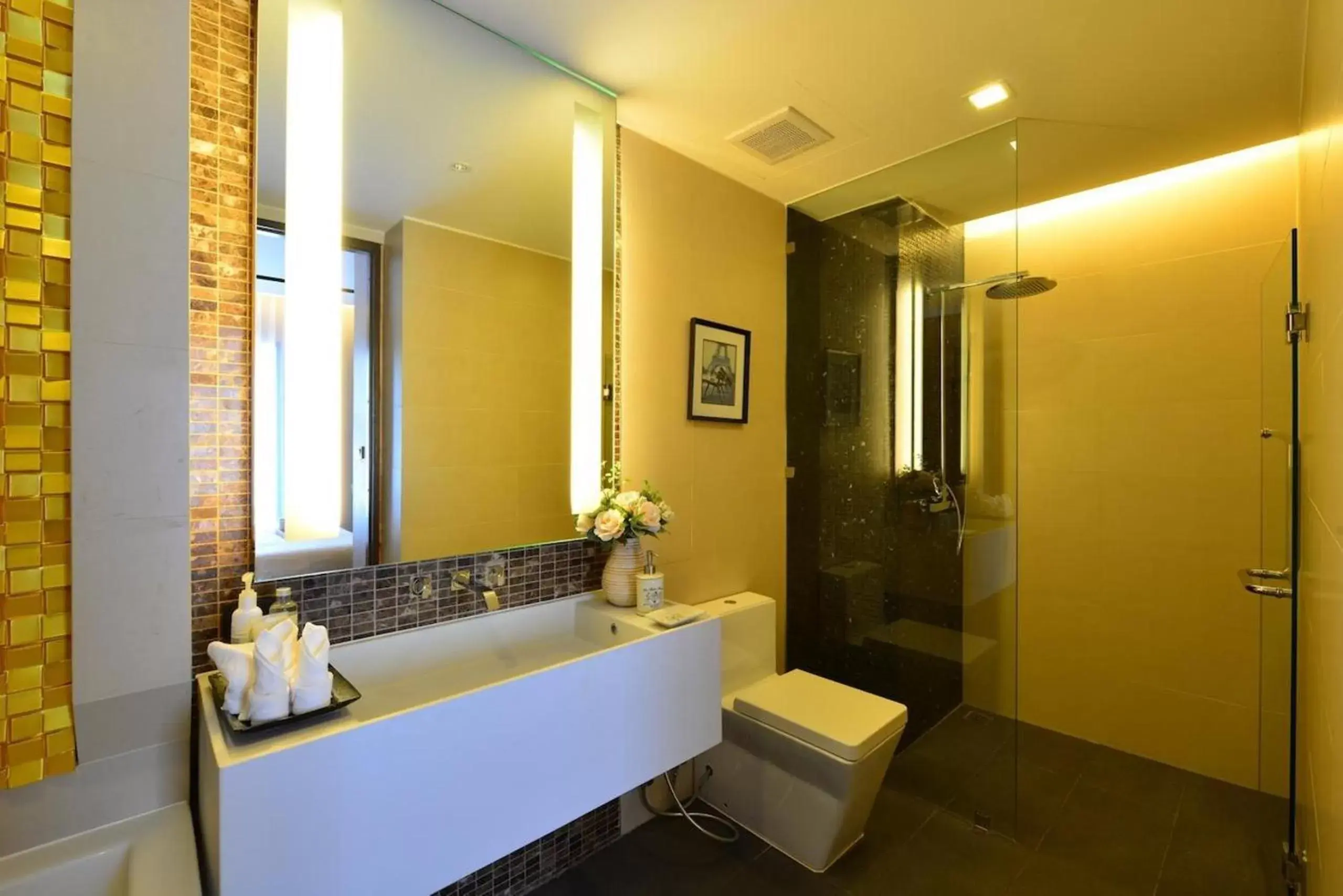 Bathroom in The Charm Resort Phuket - SHA Certified