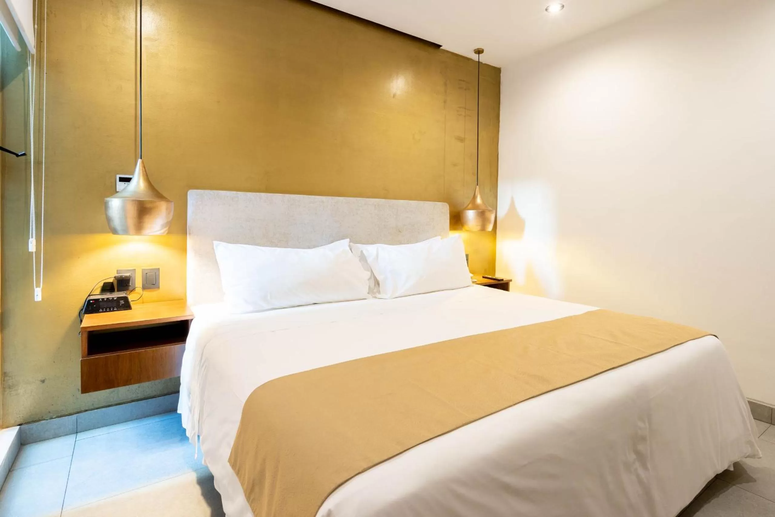 Bed in IT Boutique Hotel & Restaurant