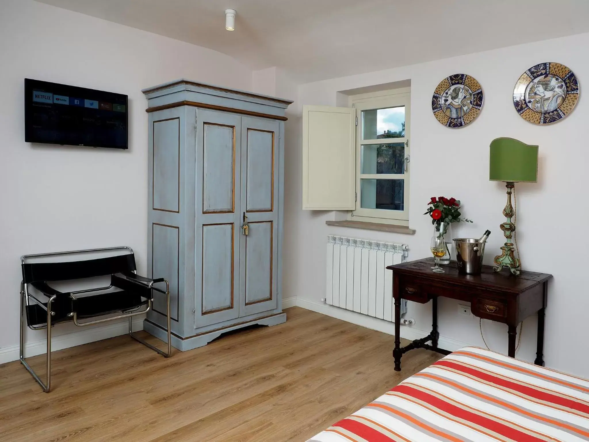 Bedroom, TV/Entertainment Center in CorteViva Boutique B&B