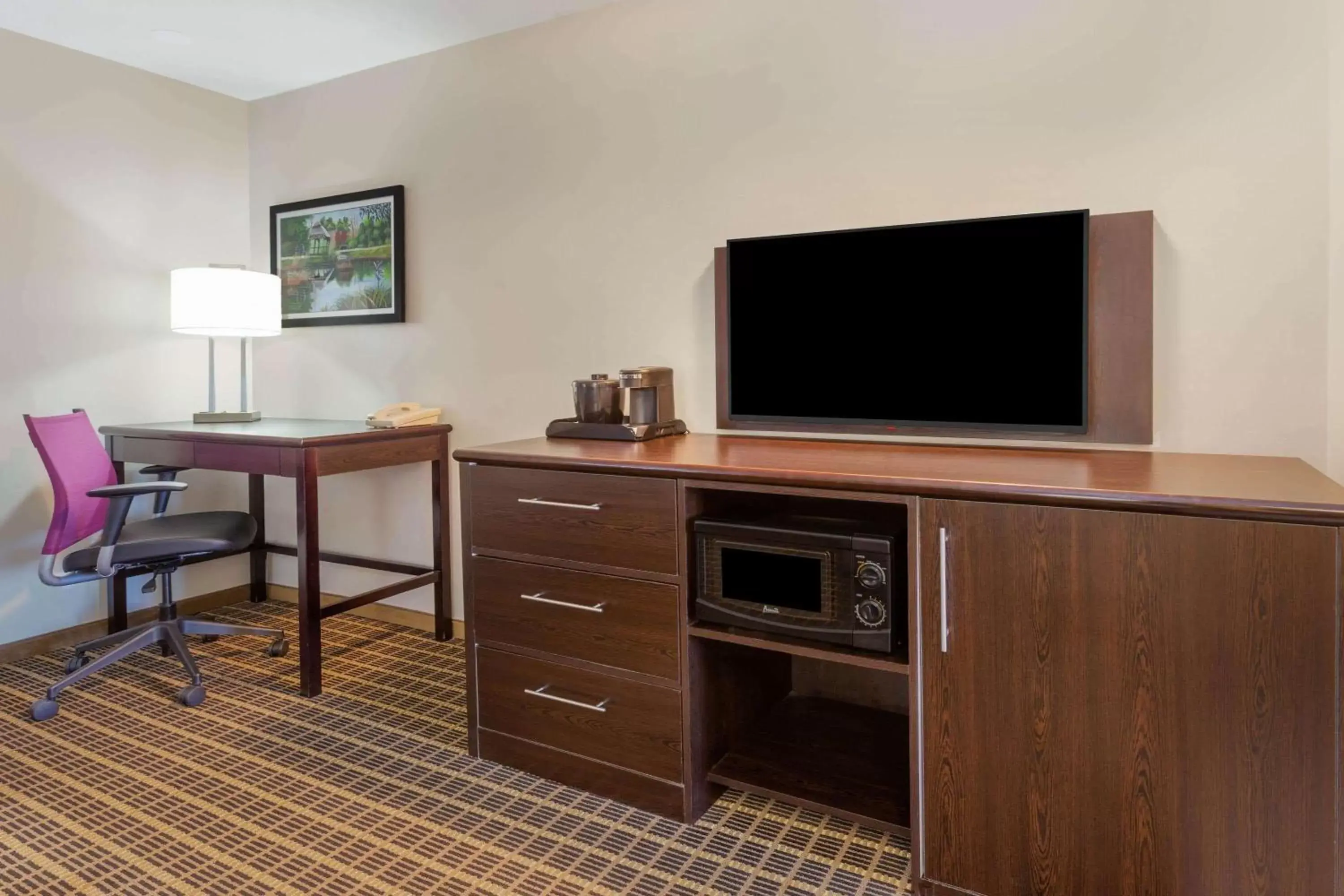Photo of the whole room, TV/Entertainment Center in La Quinta by Wyndham Rockford