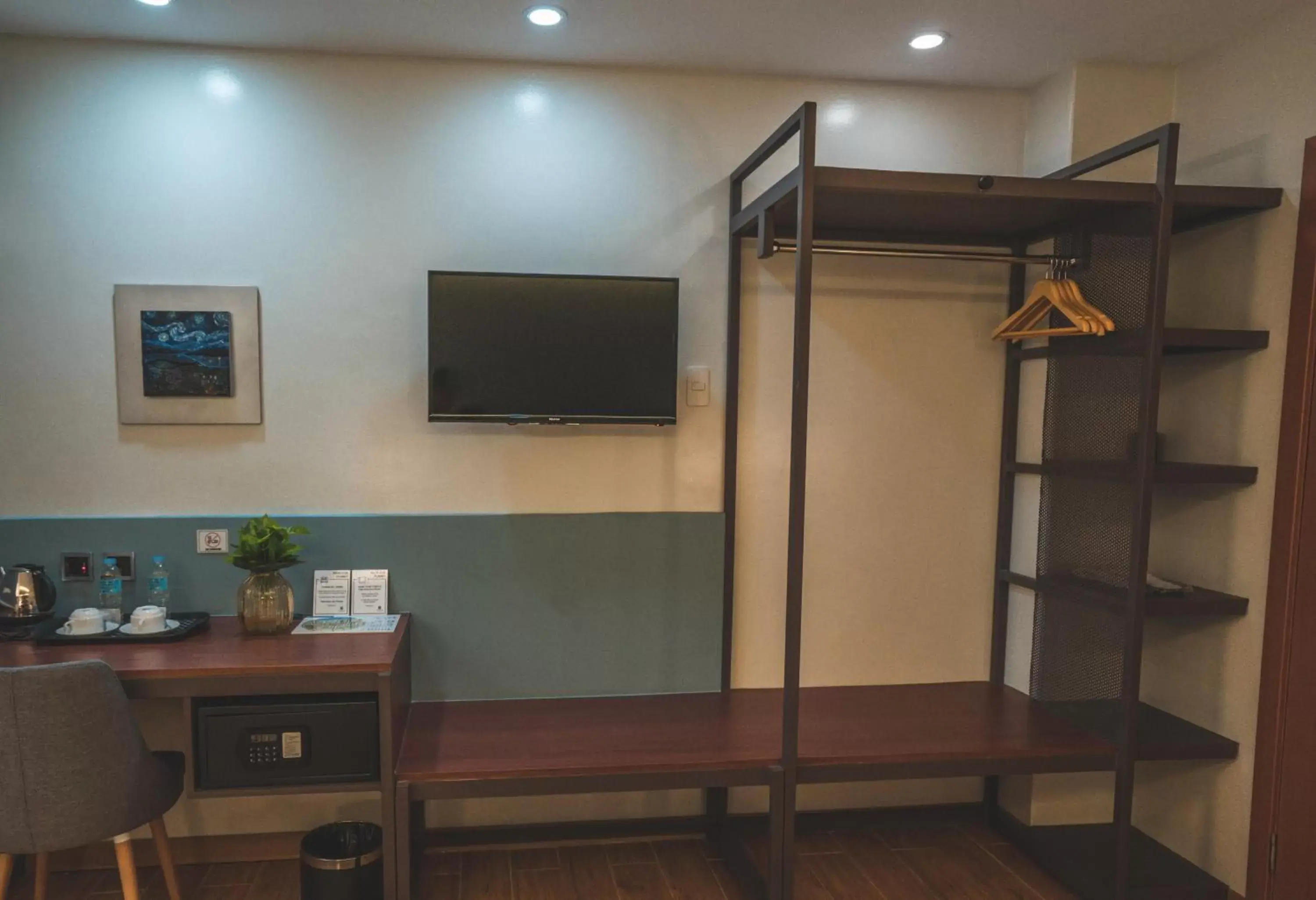 TV/Entertainment Center in Henia Hotel