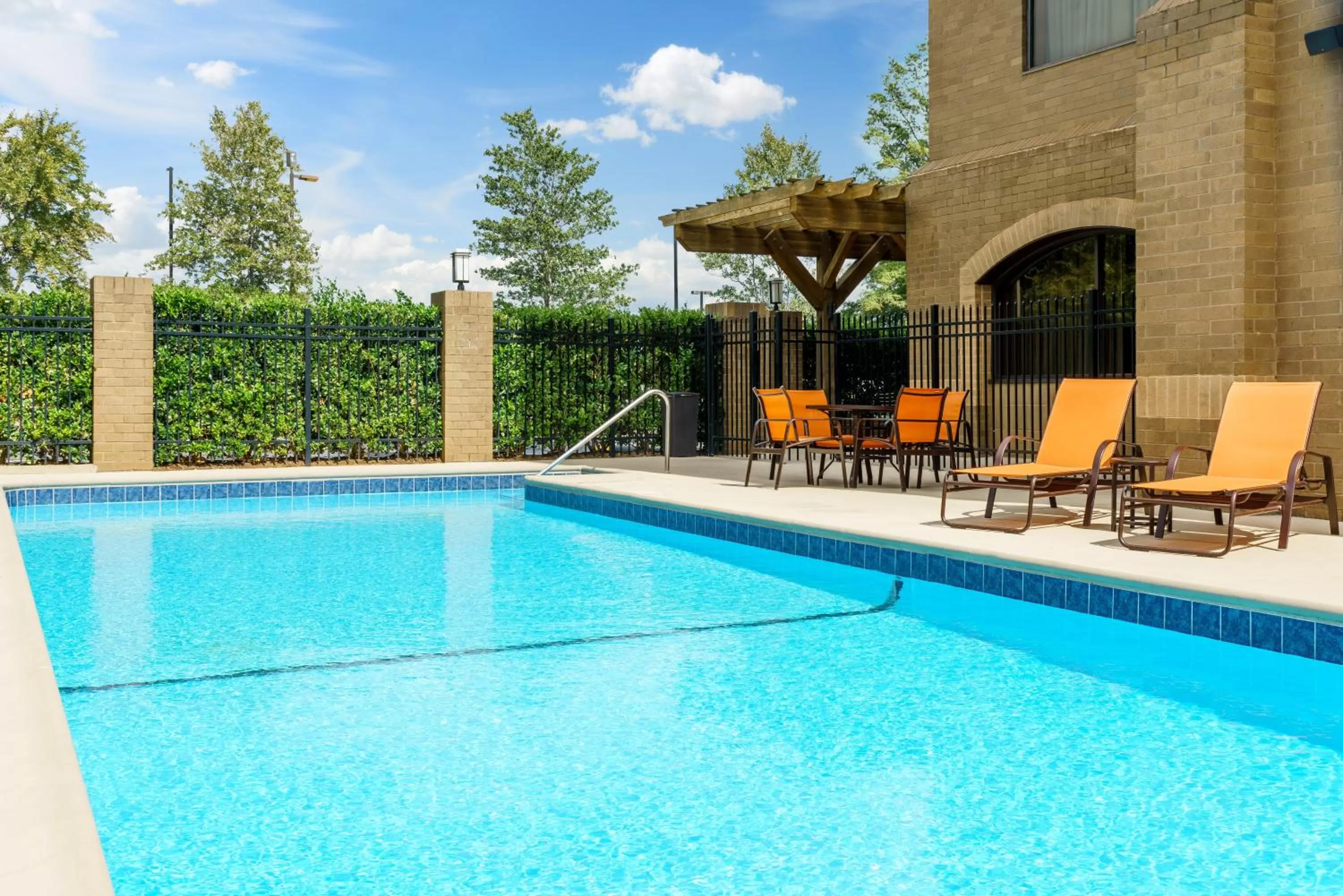 Swimming pool in Holiday Inn Charlotte University by IHG