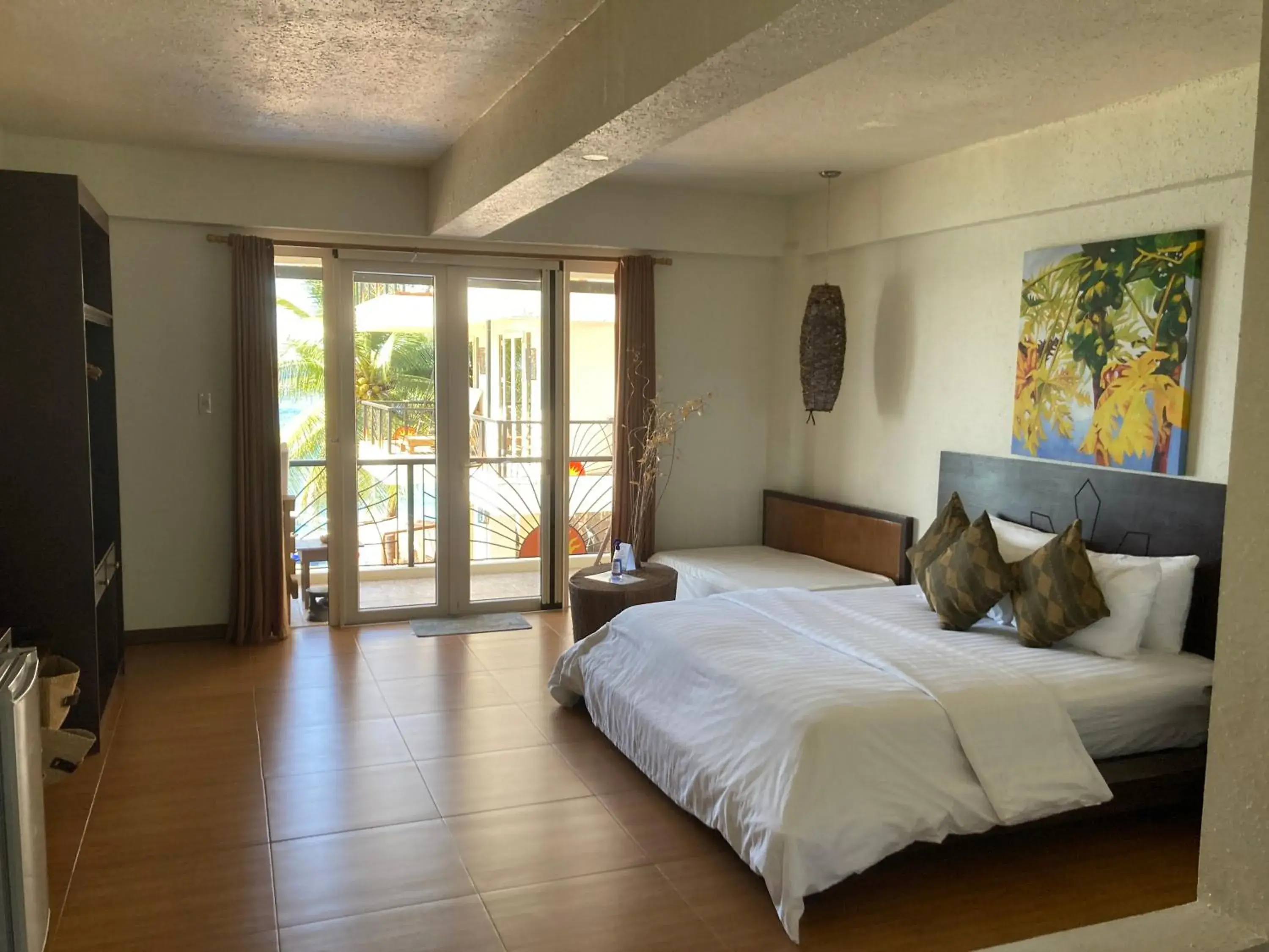 Photo of the whole room, Bed in Sunset At Aninuan Beach Resort