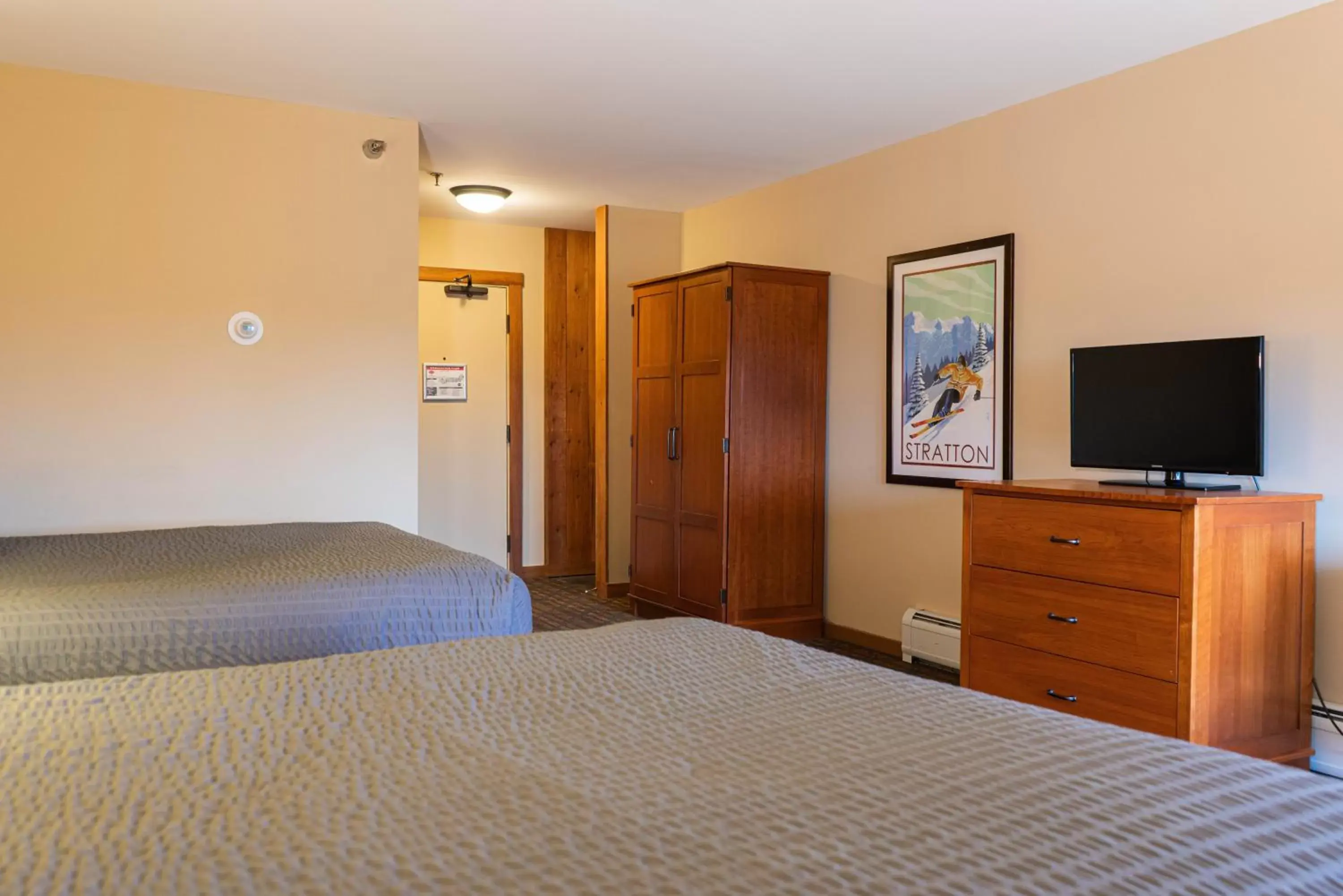 Bed in The Black Bear Lodge at Stratton Mountain Resort