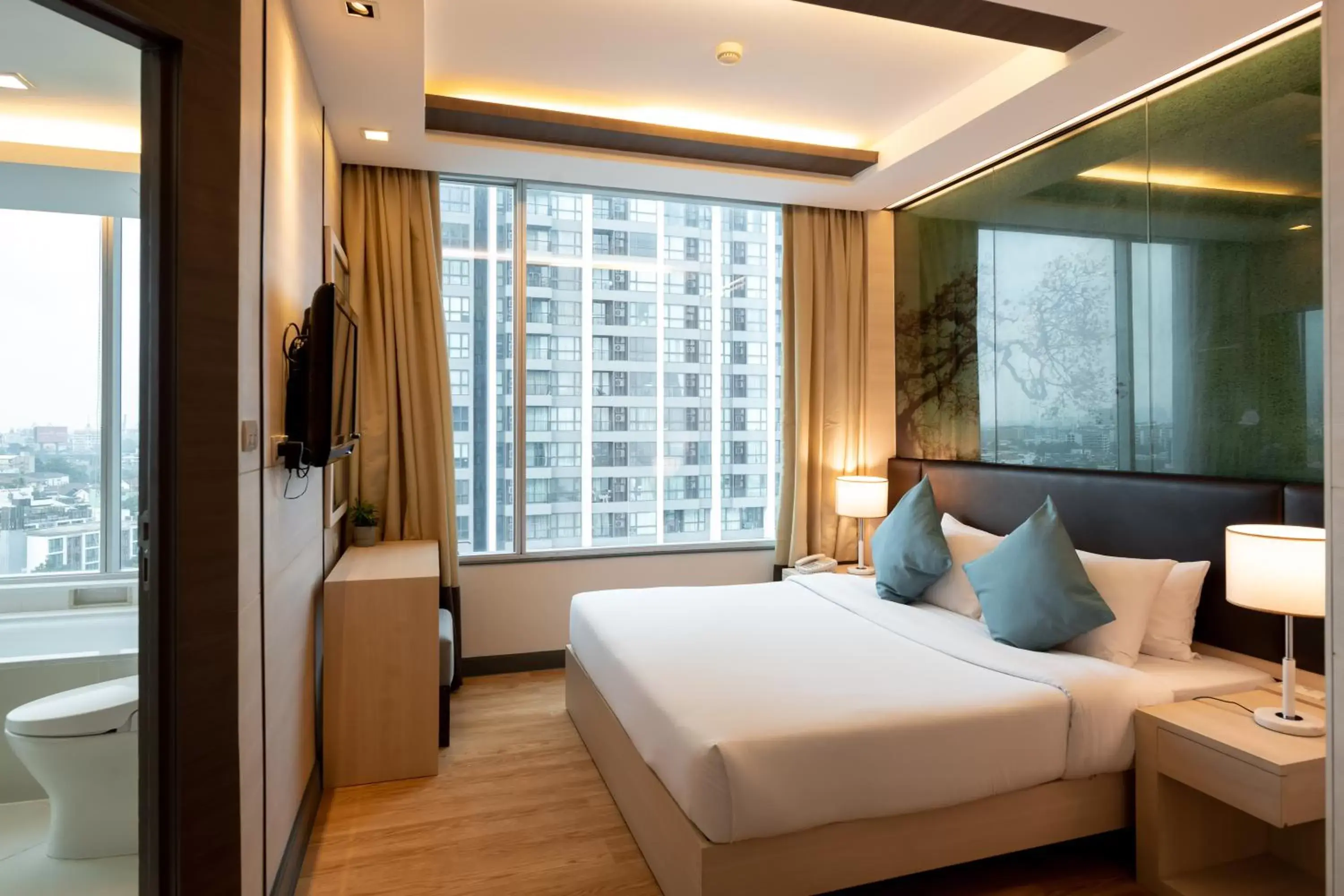 Bed in Jasmine Resort Bangkok