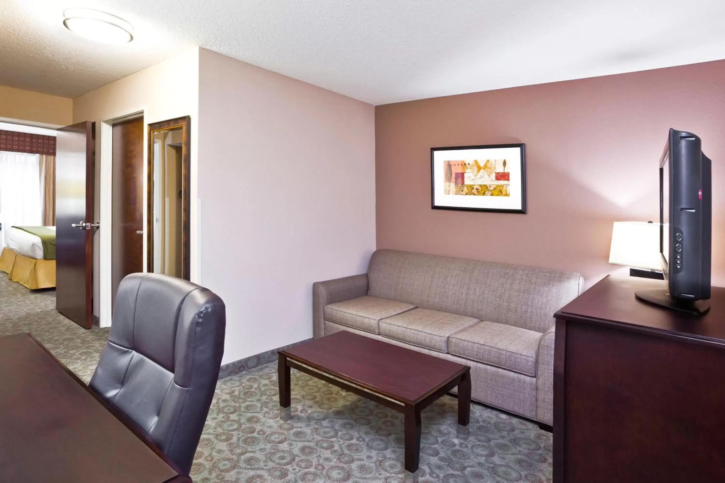 Bedroom, Seating Area in Holiday Inn Express Hotel & Suites Van Wert, an IHG Hotel