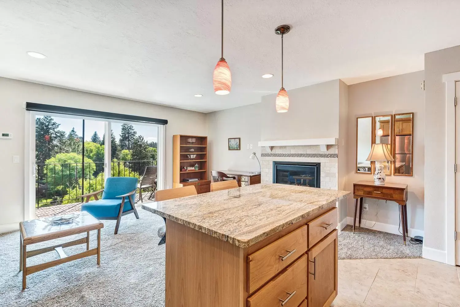 Living room, Kitchen/Kitchenette in Bend Riverside Condos
