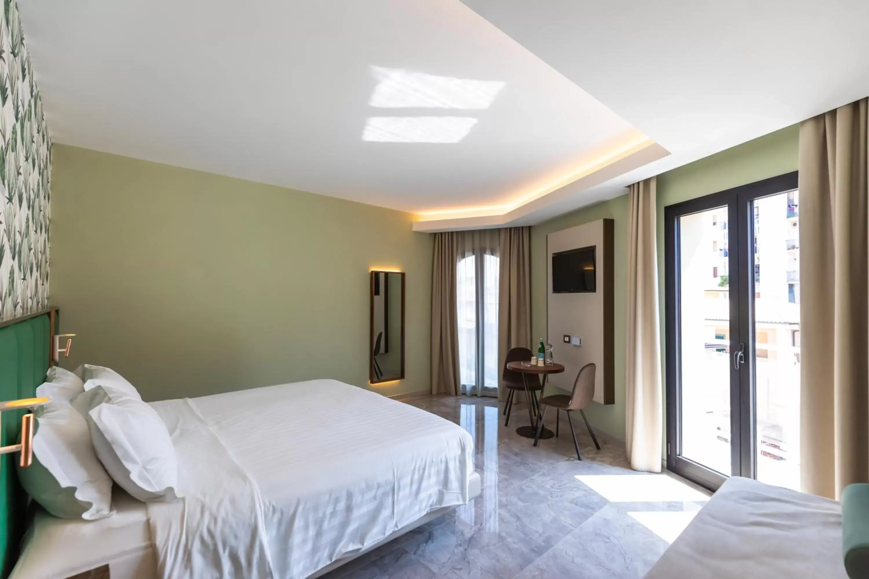 Bed in Solmaris Tropea Rooms & Suites