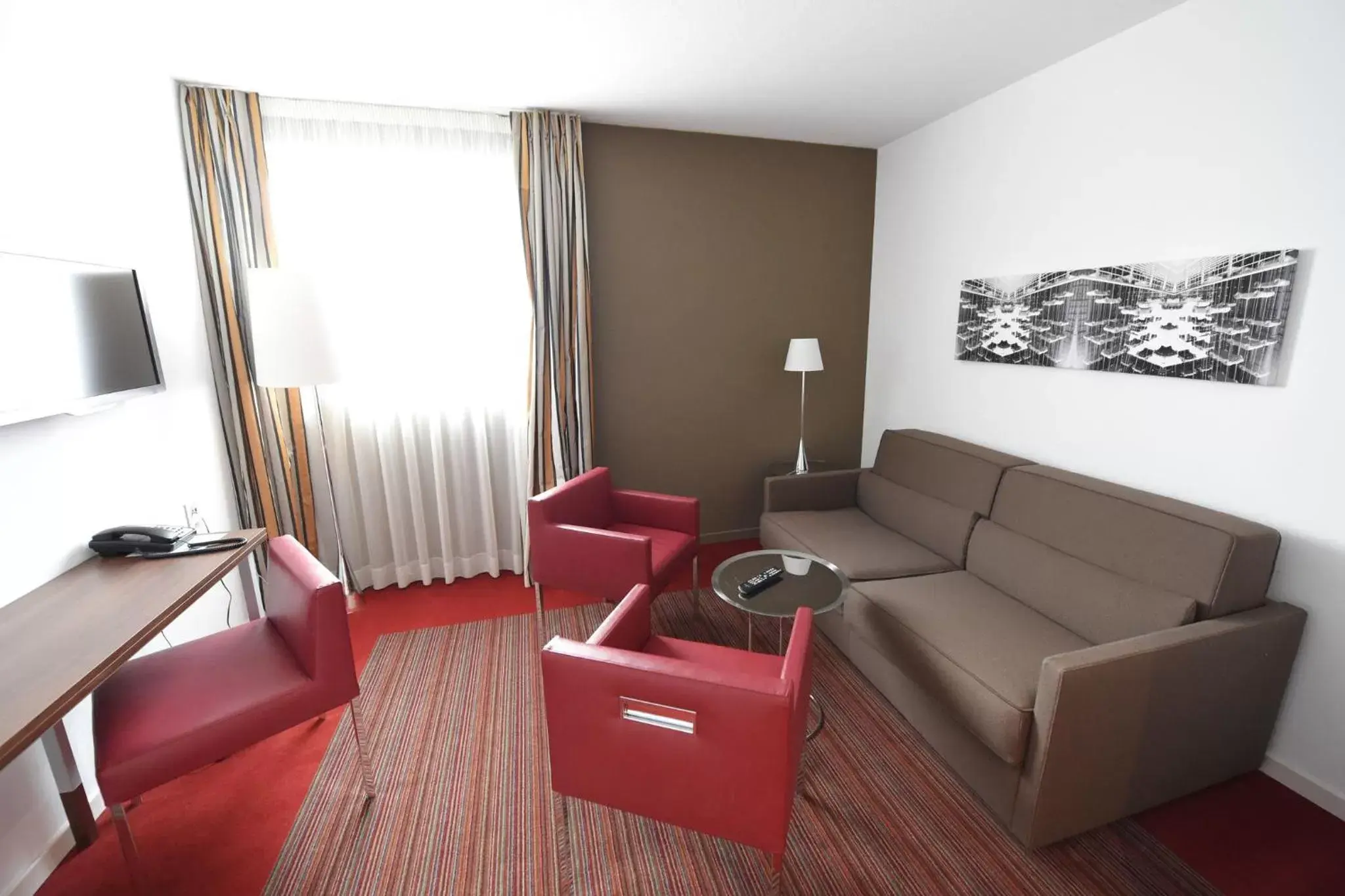 Photo of the whole room, Seating Area in Holiday Inn Mulhouse, an IHG Hotel