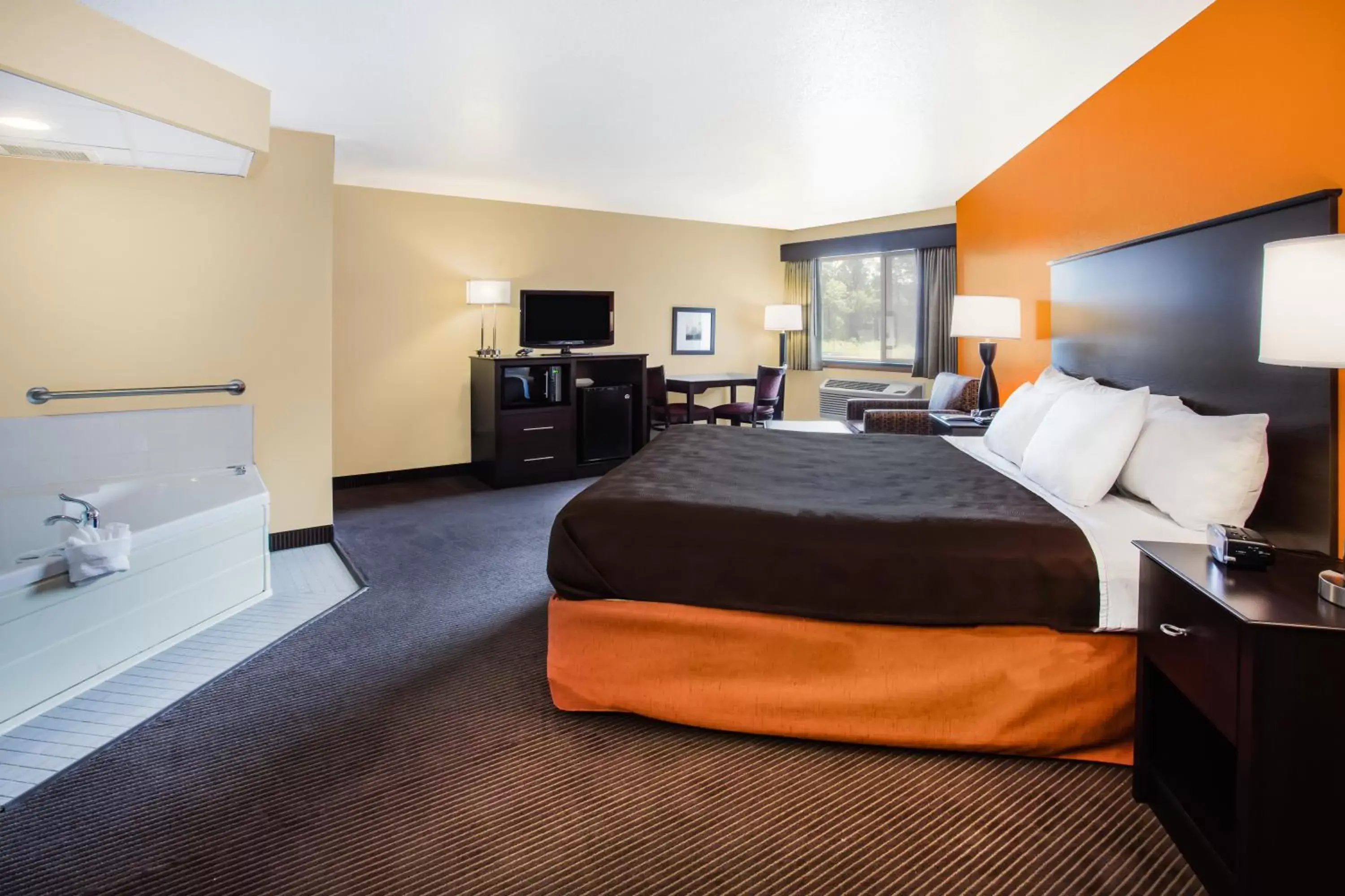 Bedroom, Bed in AmericInn by Wyndham Menomonie