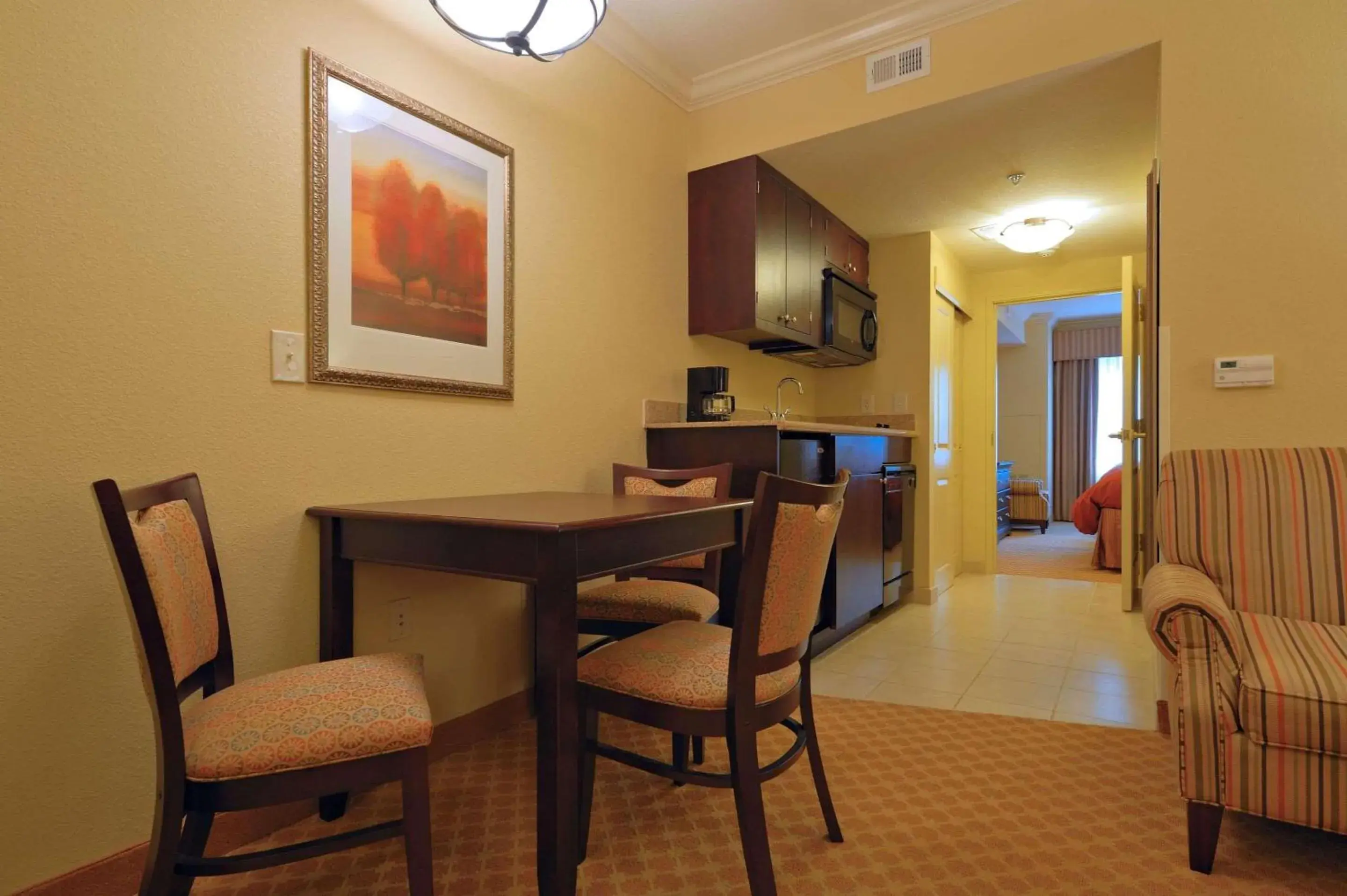 Bedroom, Dining Area in Country Inn & Suites by Radisson, Columbia at Harbison, SC