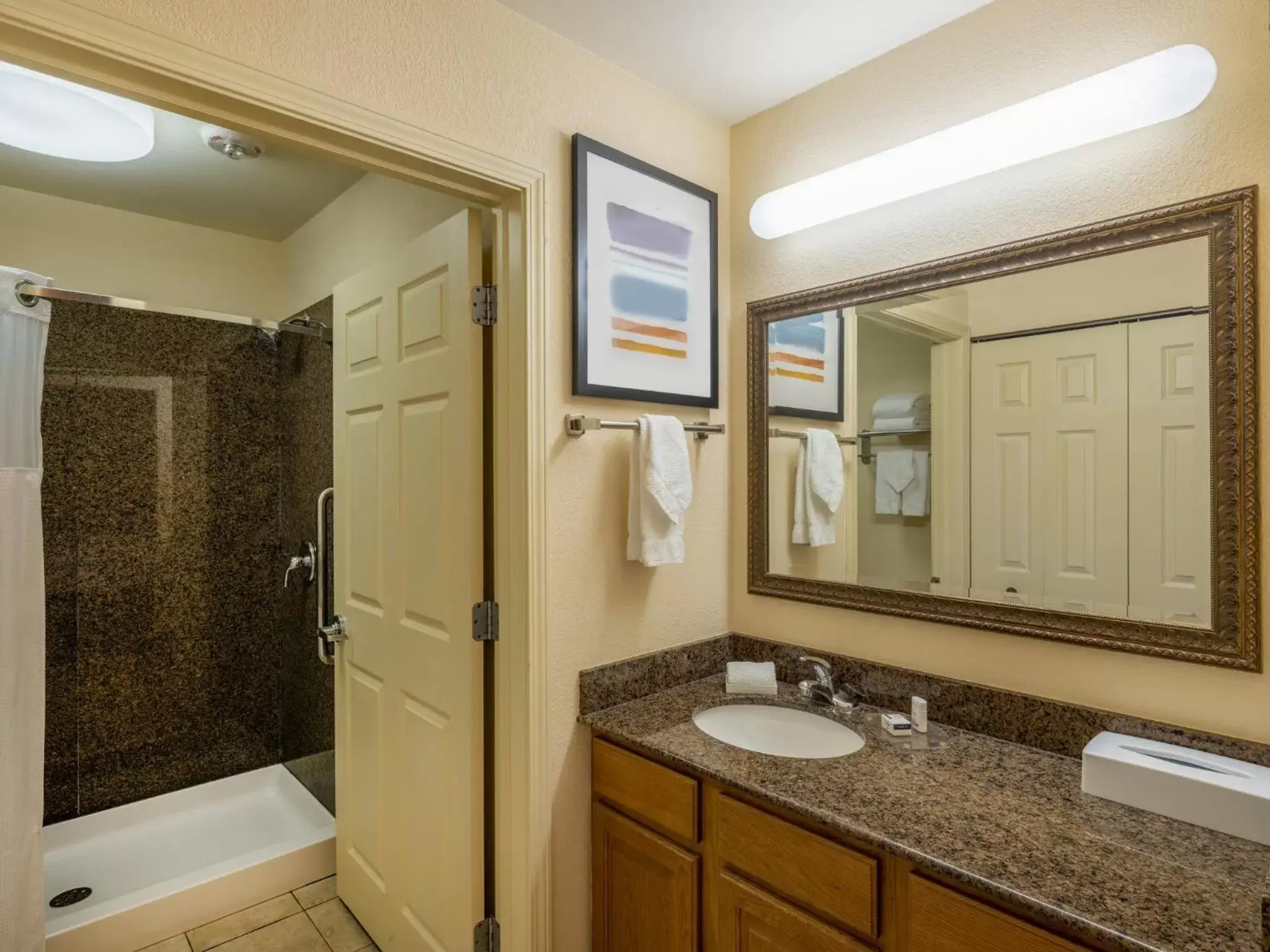 Bathroom in Staybridge Suites Milwaukee Airport South, an IHG Hotel