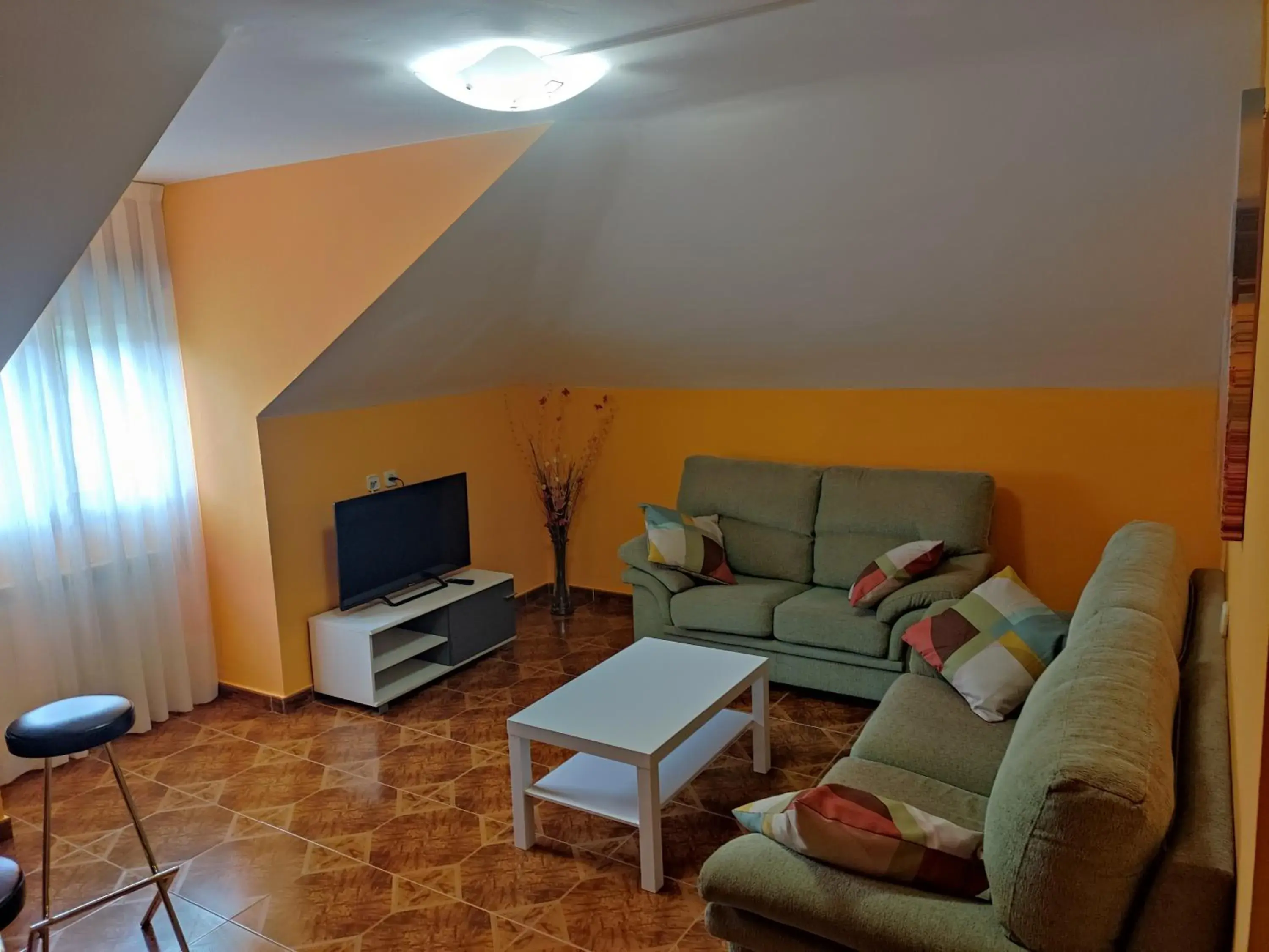 Communal lounge/ TV room, Seating Area in Hotel Peñagrande