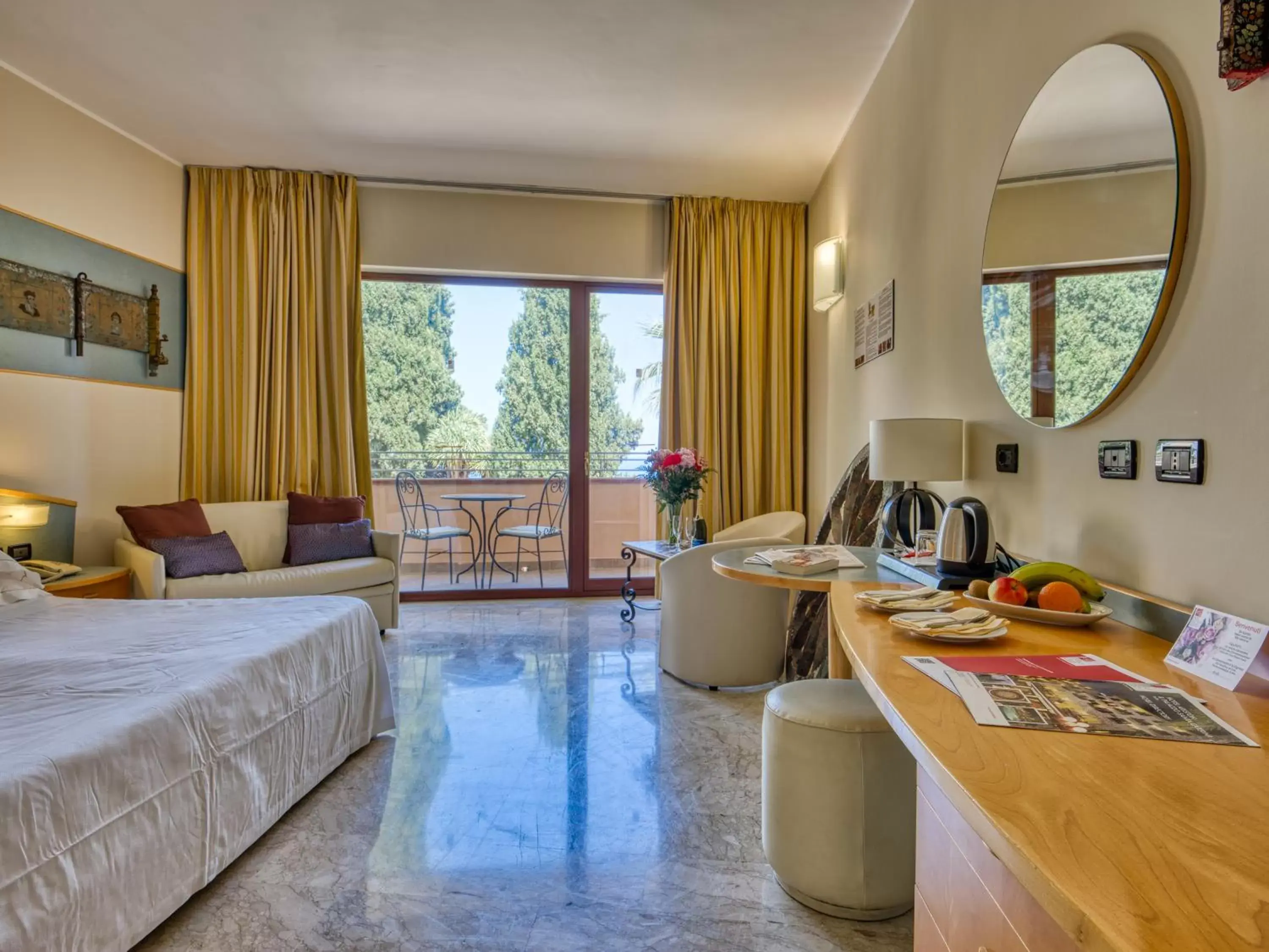Bedroom in Hotel Ariston and Palazzo Santa Caterina