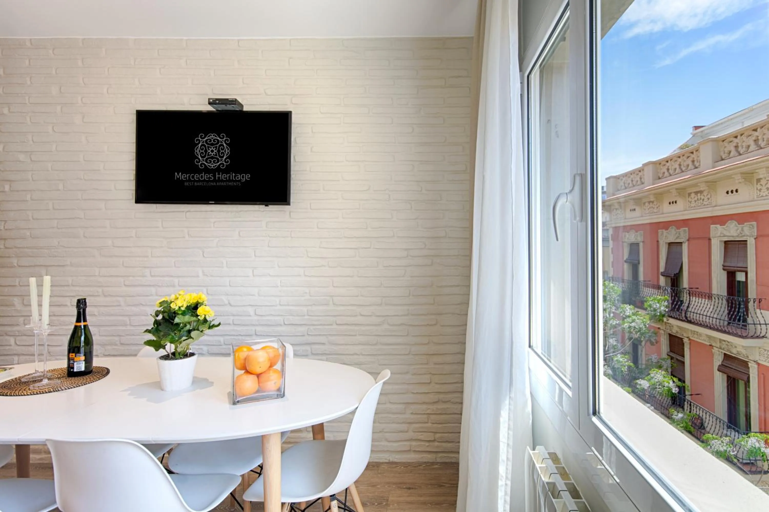 TV and multimedia in Eixample Building Apartments by Mercedes Heritage