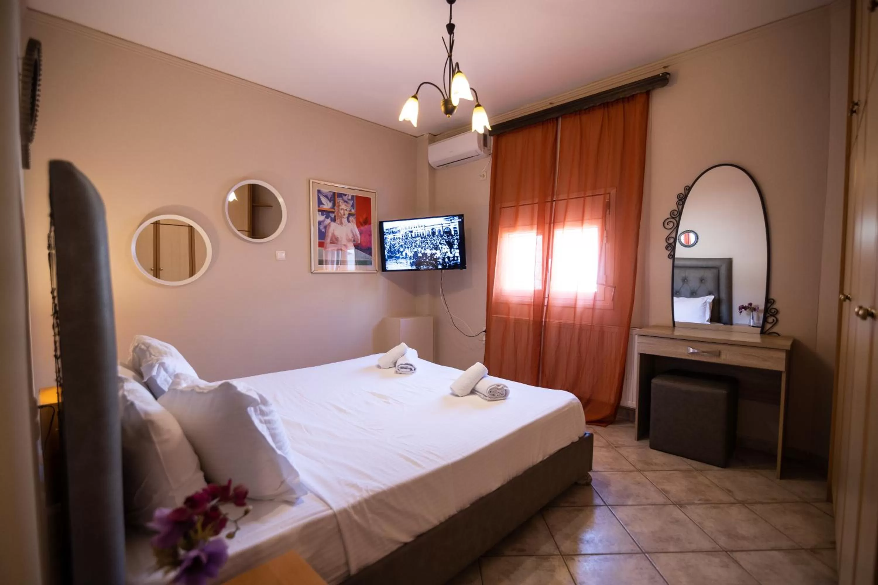 Bed in Votsalakia Hotel & Luxury Apartments