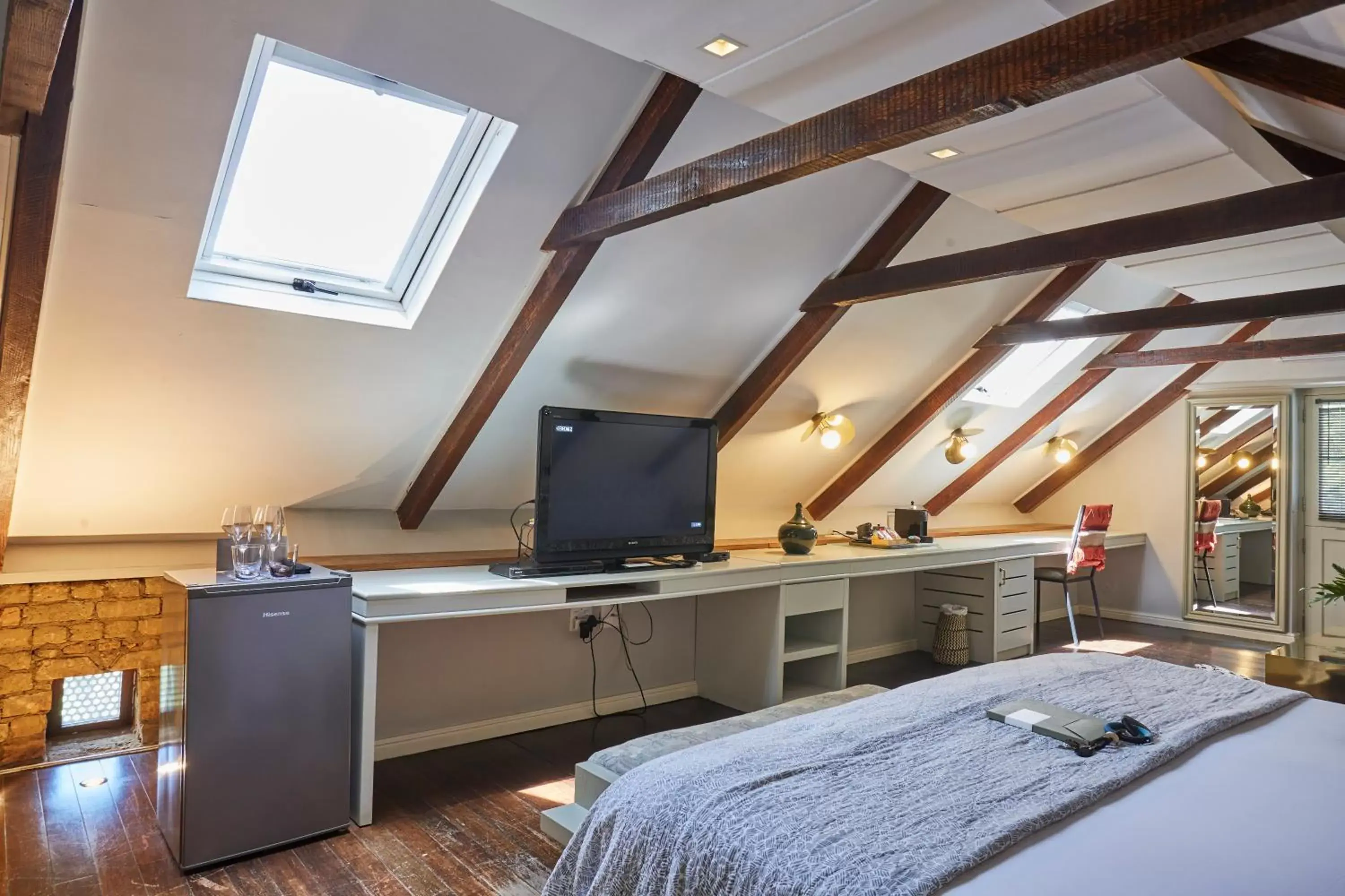 Bedroom, TV/Entertainment Center in The Robertson Small Hotel by The Living Journey Collection