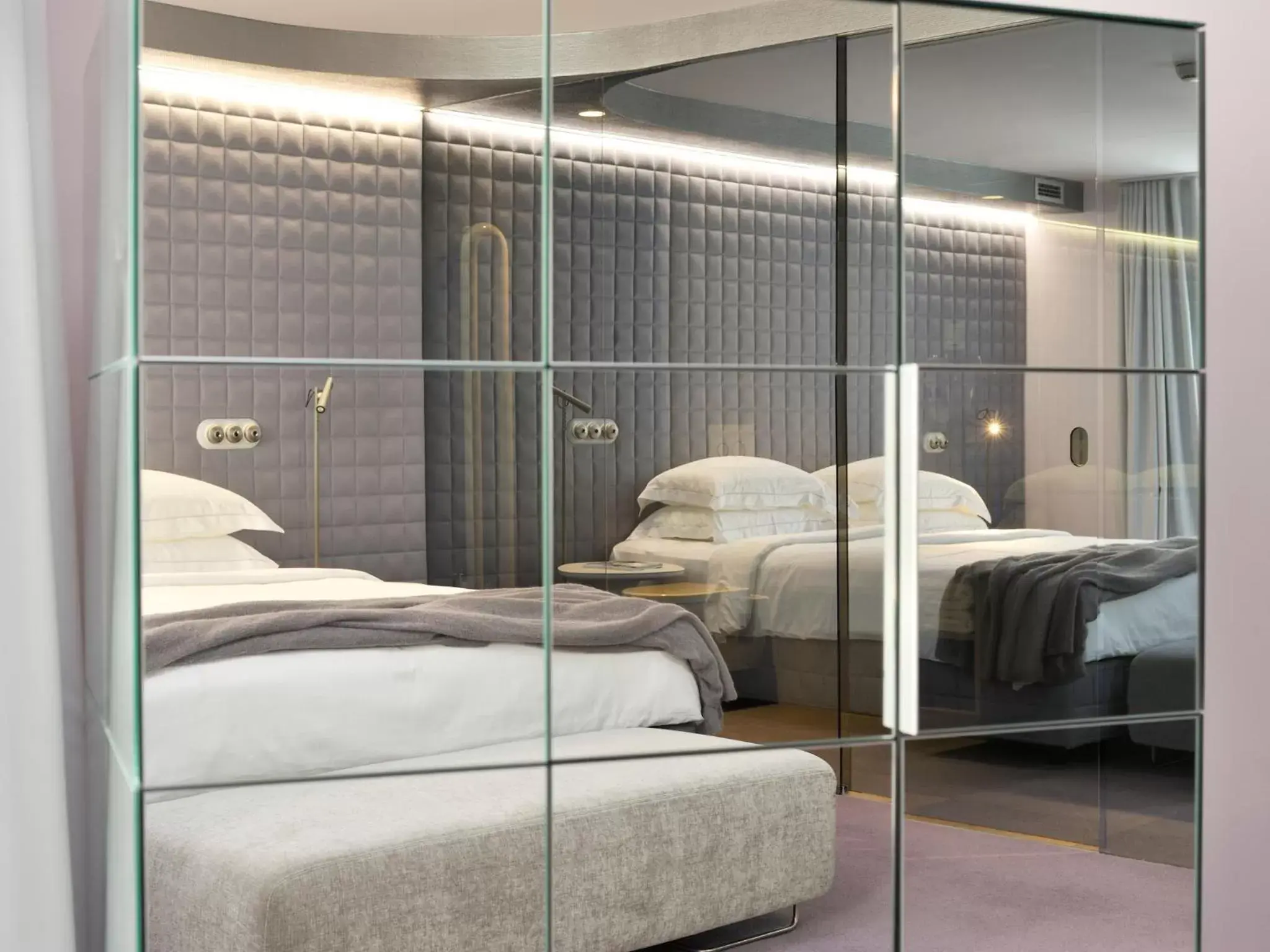 Bed in Vander Urbani Resort - a Member of Design Hotels