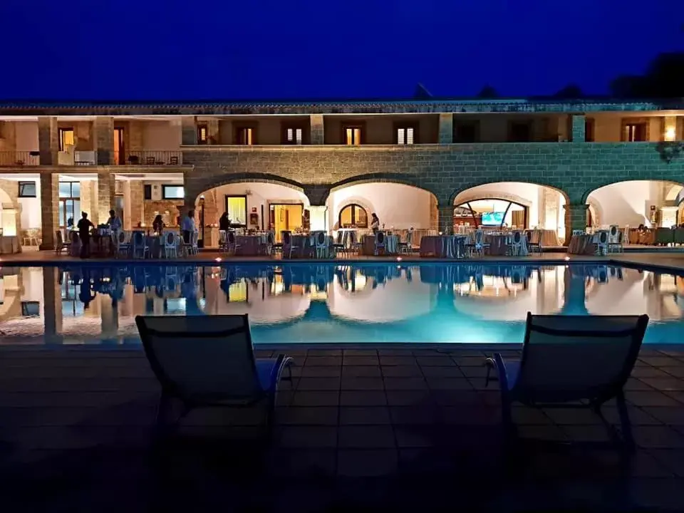 Evening entertainment, Swimming Pool in Antica Masseria Martuccio