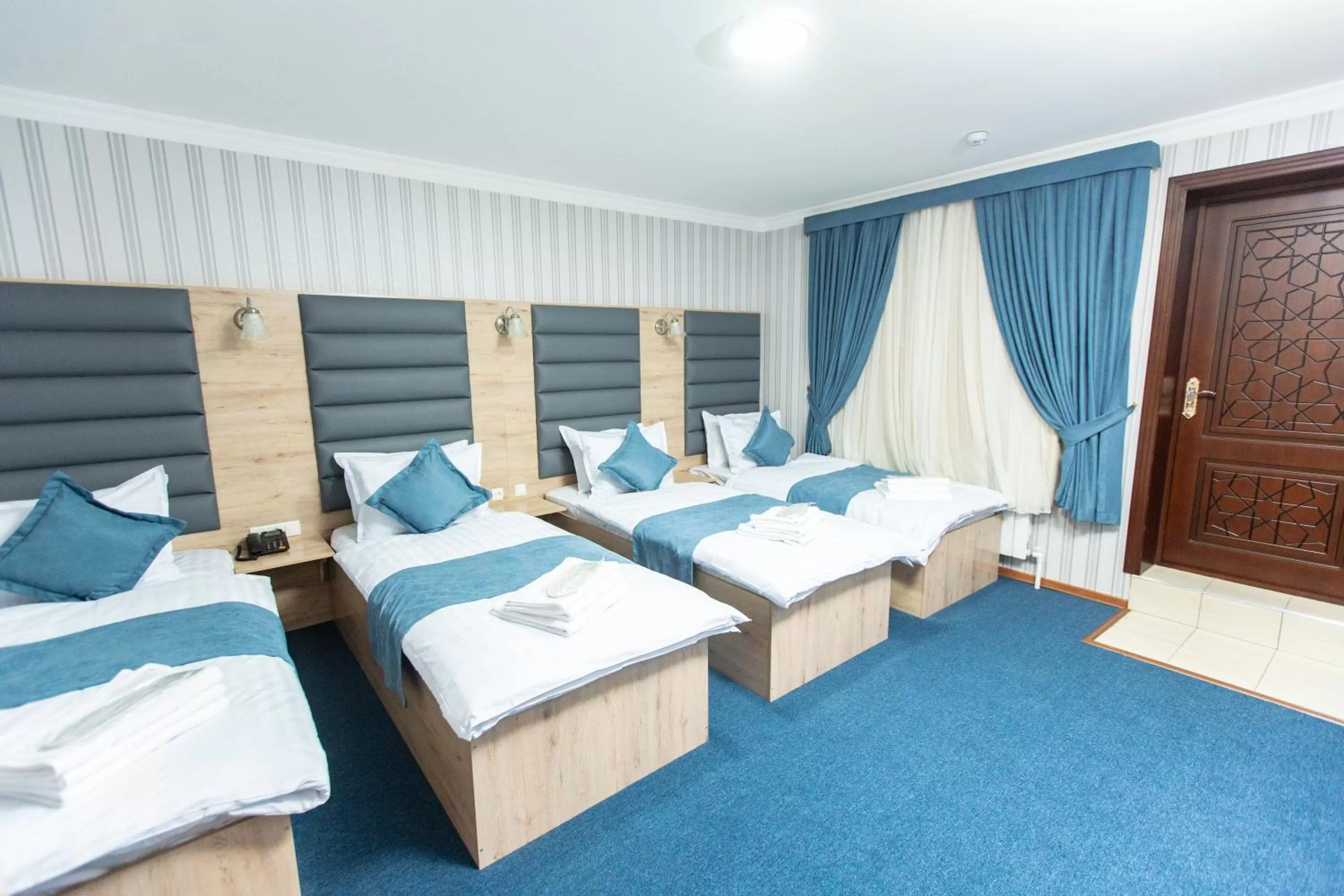 Bed in Mirzo Boutique Hotel