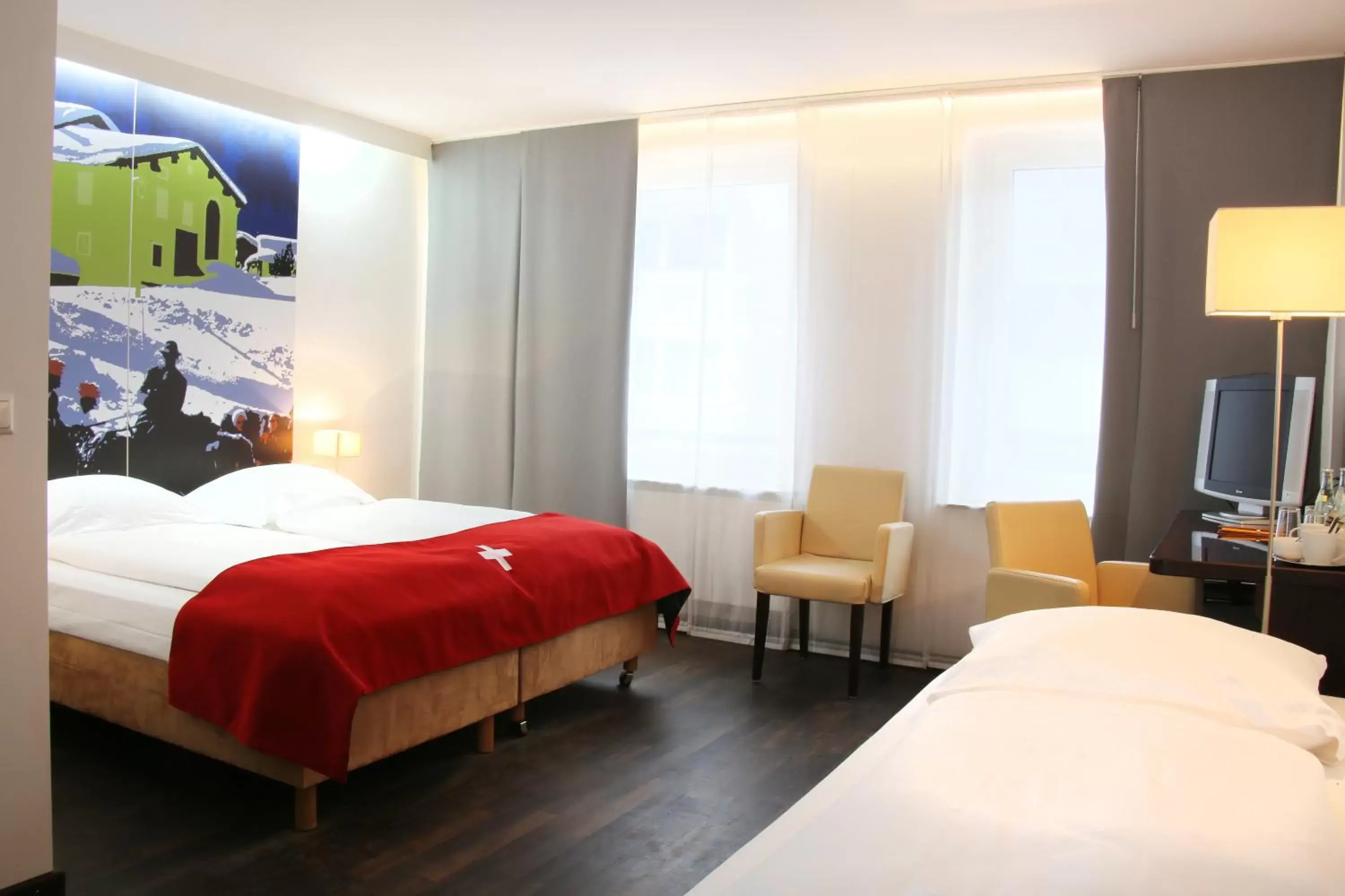 Bedroom, Bed in Helvetia Hotel Munich City Center