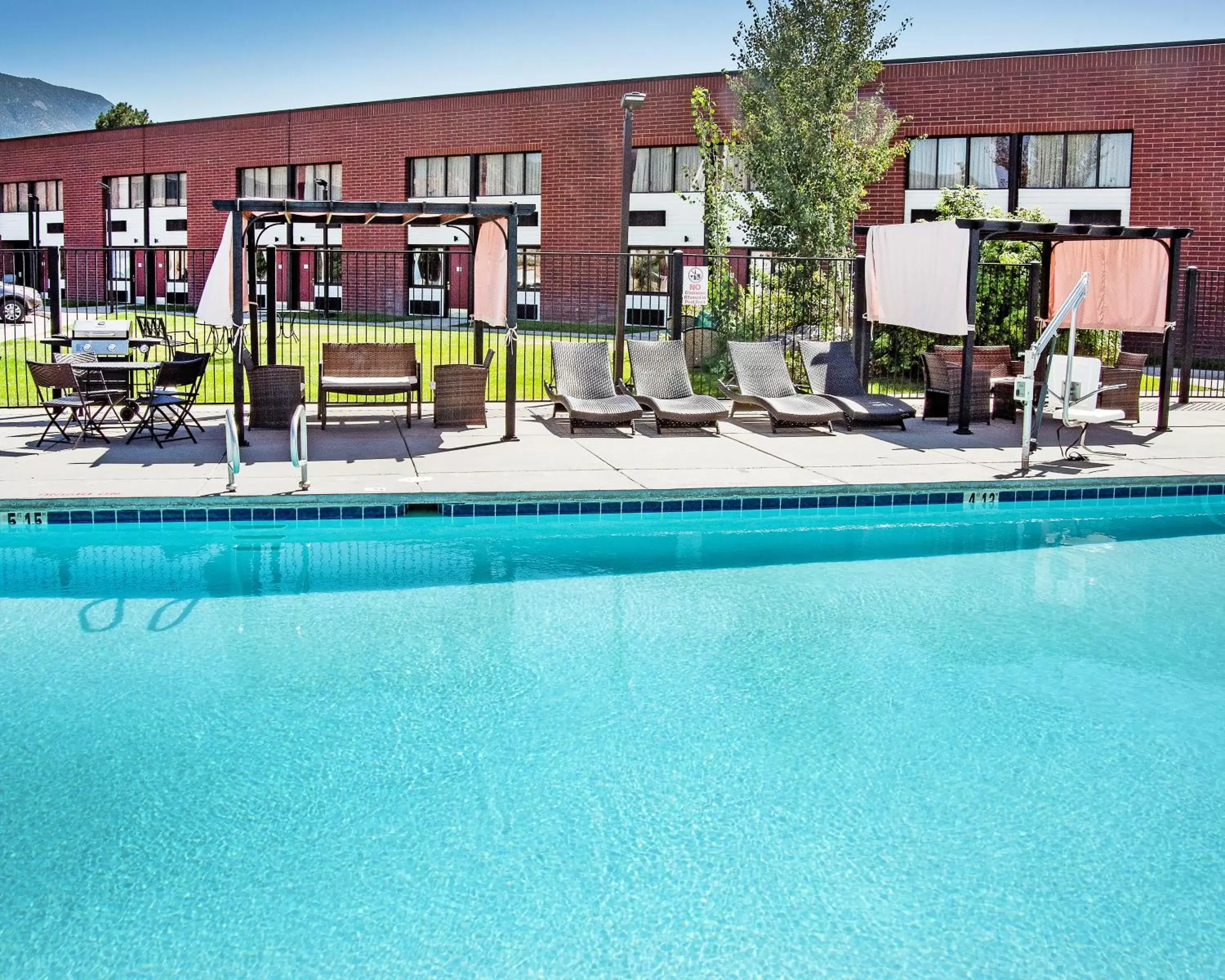 Property building, Swimming Pool in Ramada by Wyndham Cedar City