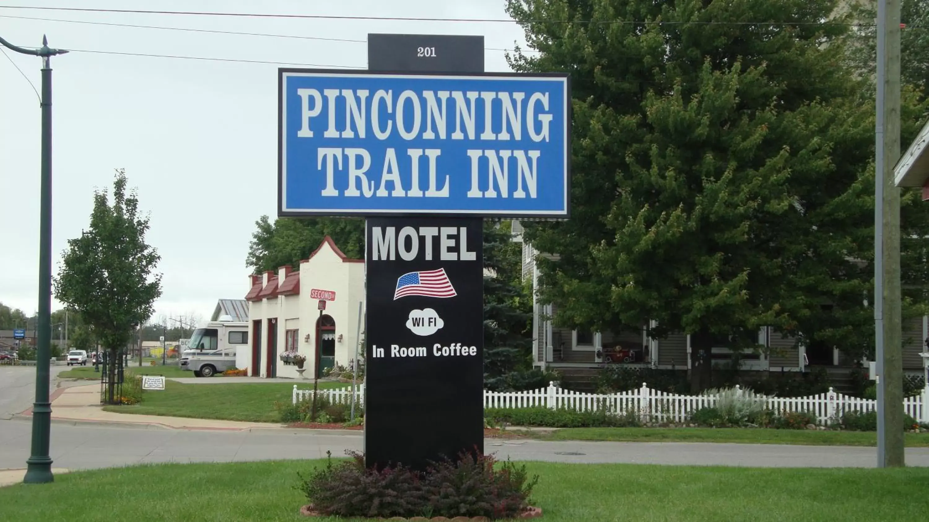 Property logo or sign in Pinconning Trail Inn Motel