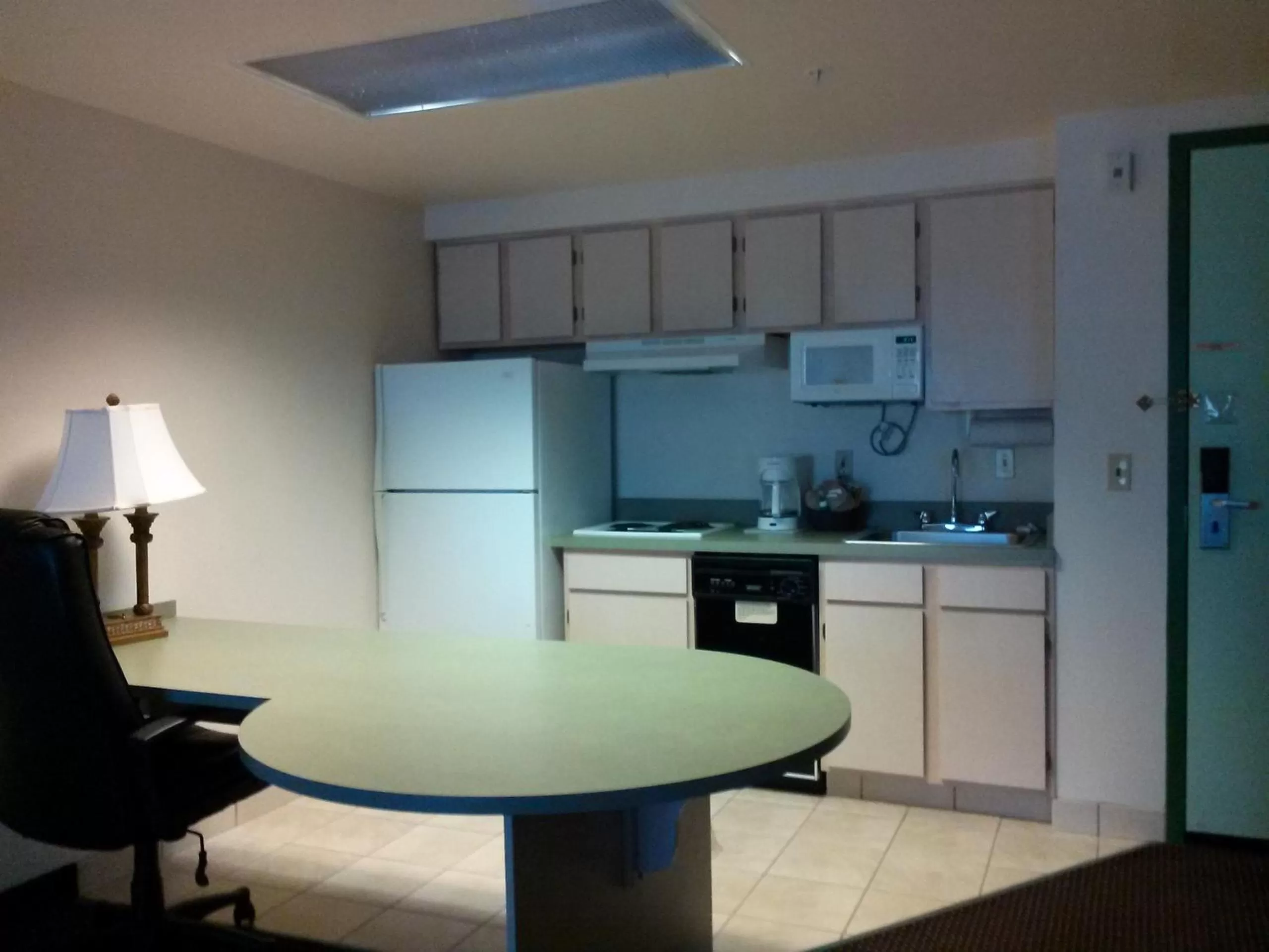 Kitchen or kitchenette in Allure Suites of Fort Myers