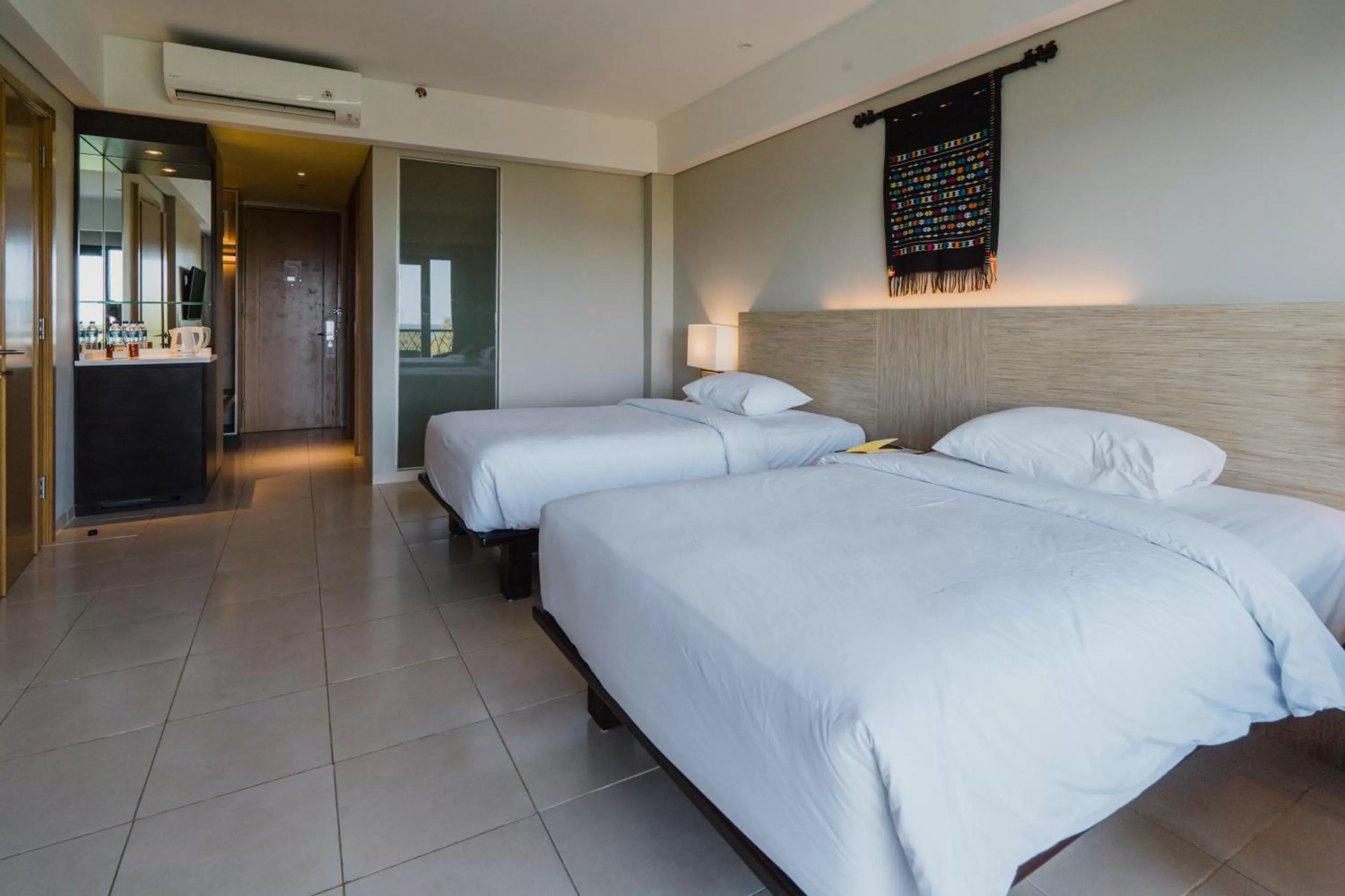 Bed in Bintang Flores Hotel