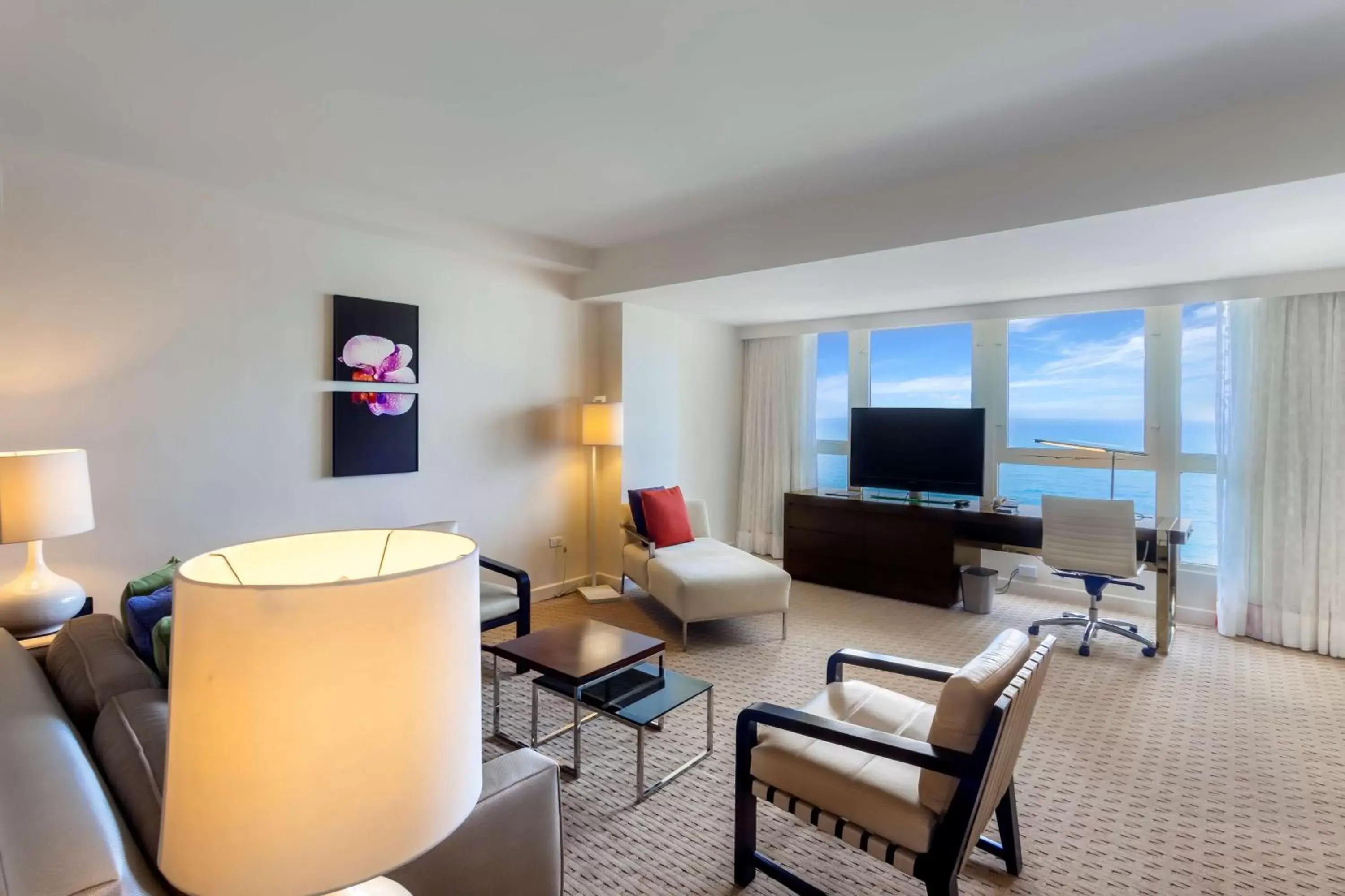 Bed, Seating Area in Caribe Hilton