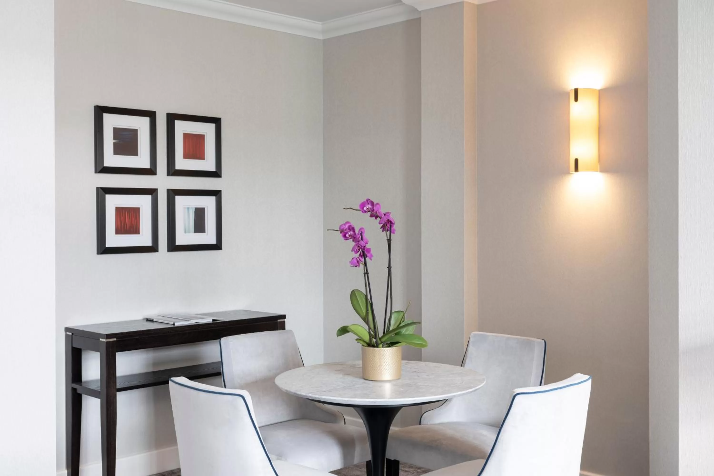 Dining area in Tower Residences by Blue Orchid