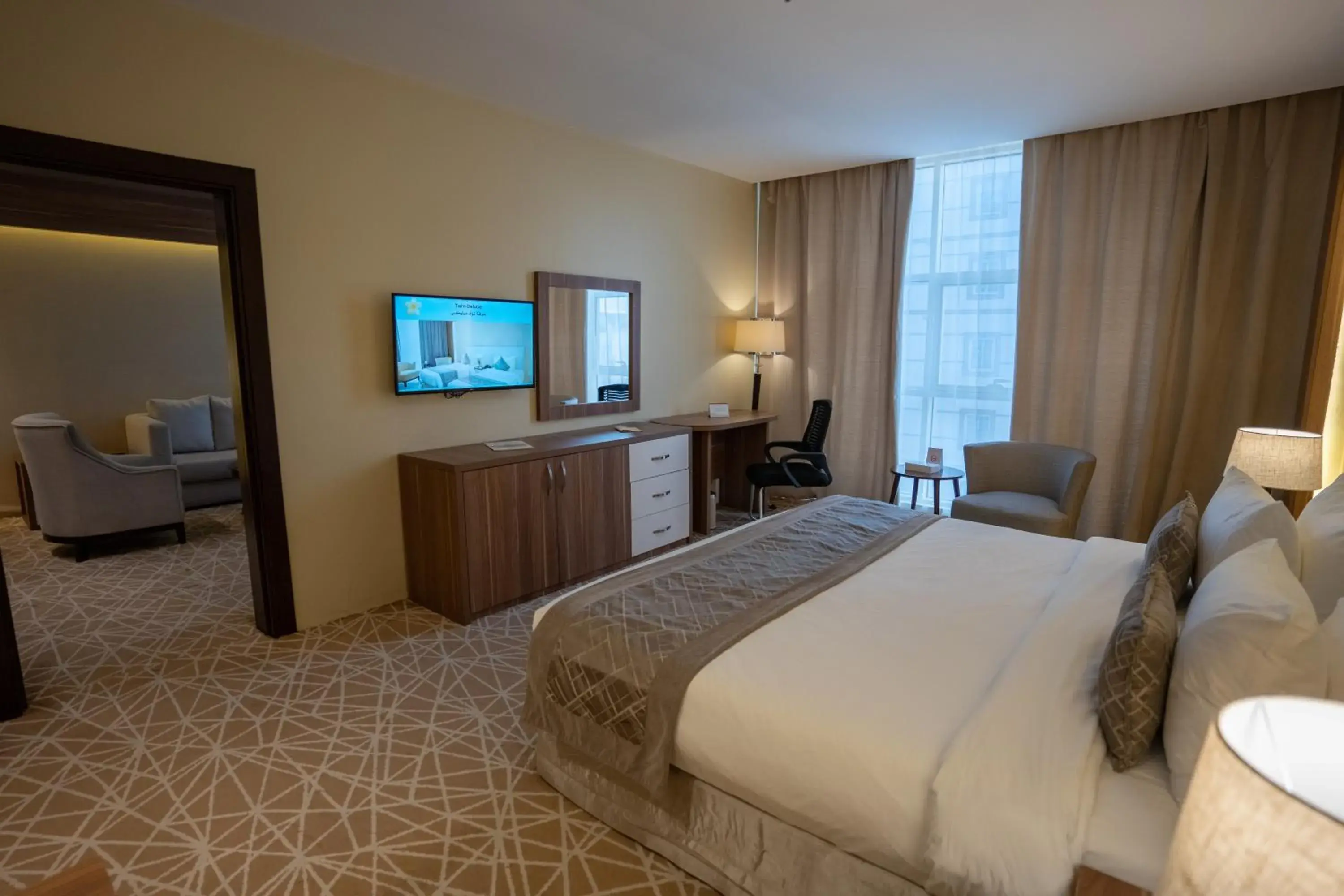 Bedroom, TV/Entertainment Center in Address Al Hamra Hotel