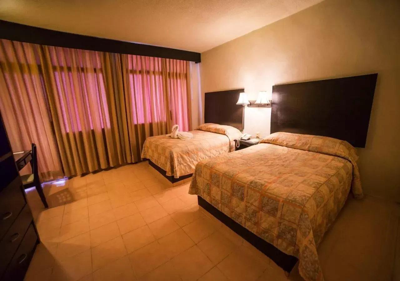 Bed in Hotel Marlon