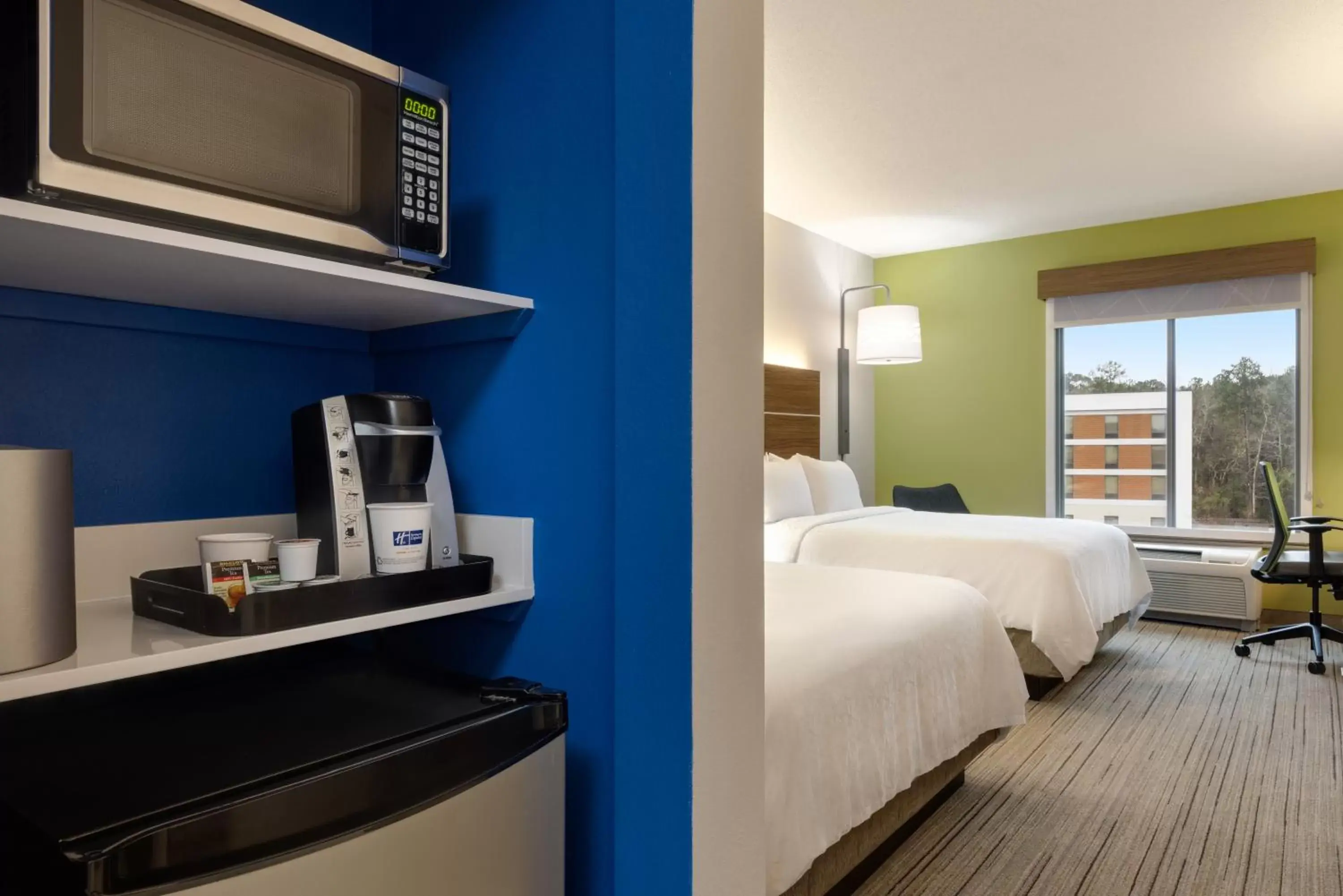 Bedroom in Holiday Inn Express Hotel & Suites Opelika Auburn, an IHG Hotel