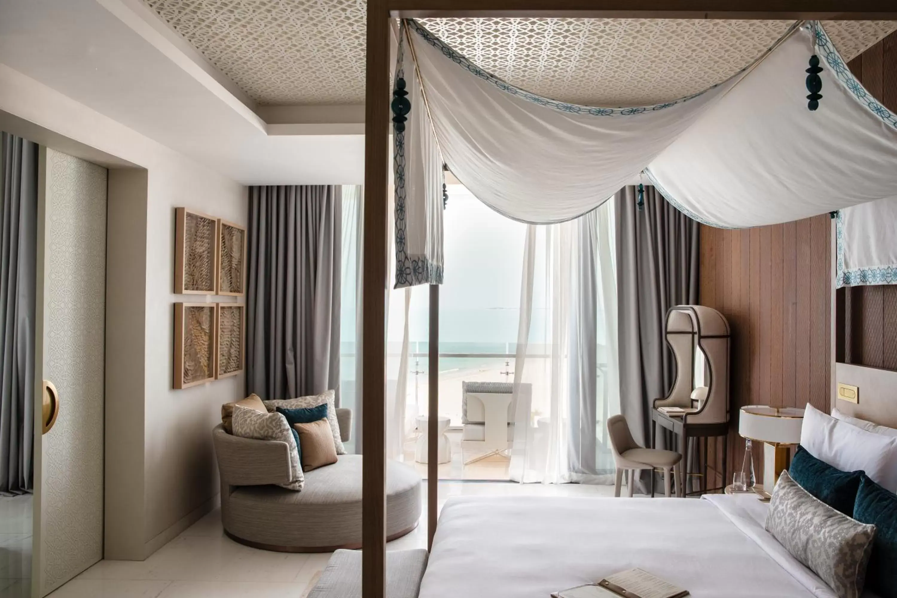 Bed, Seating Area in Jumeirah at Saadiyat Island Resort