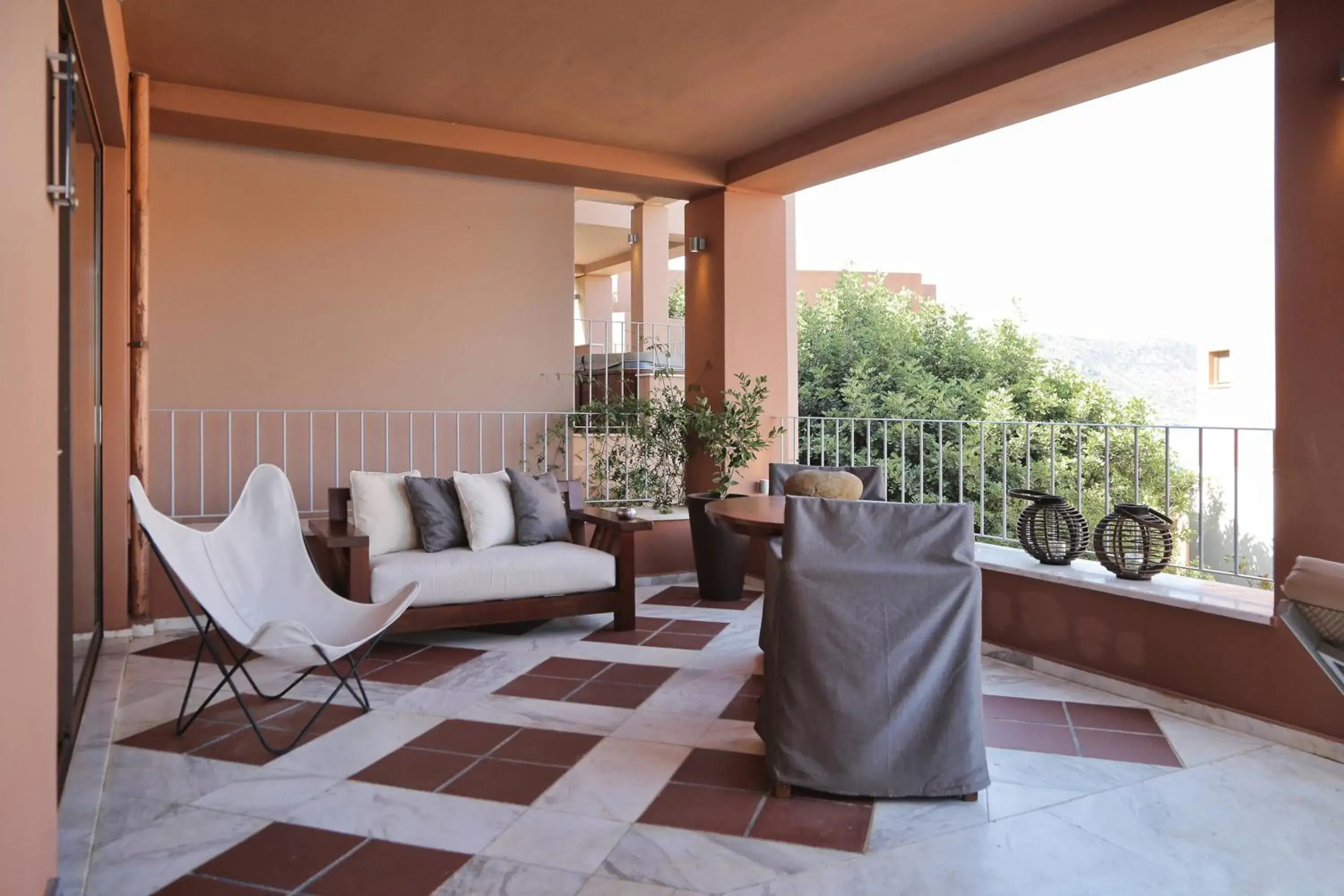 Photo of the whole room, Balcony/Terrace in Domes of Elounda, Autograph Collection