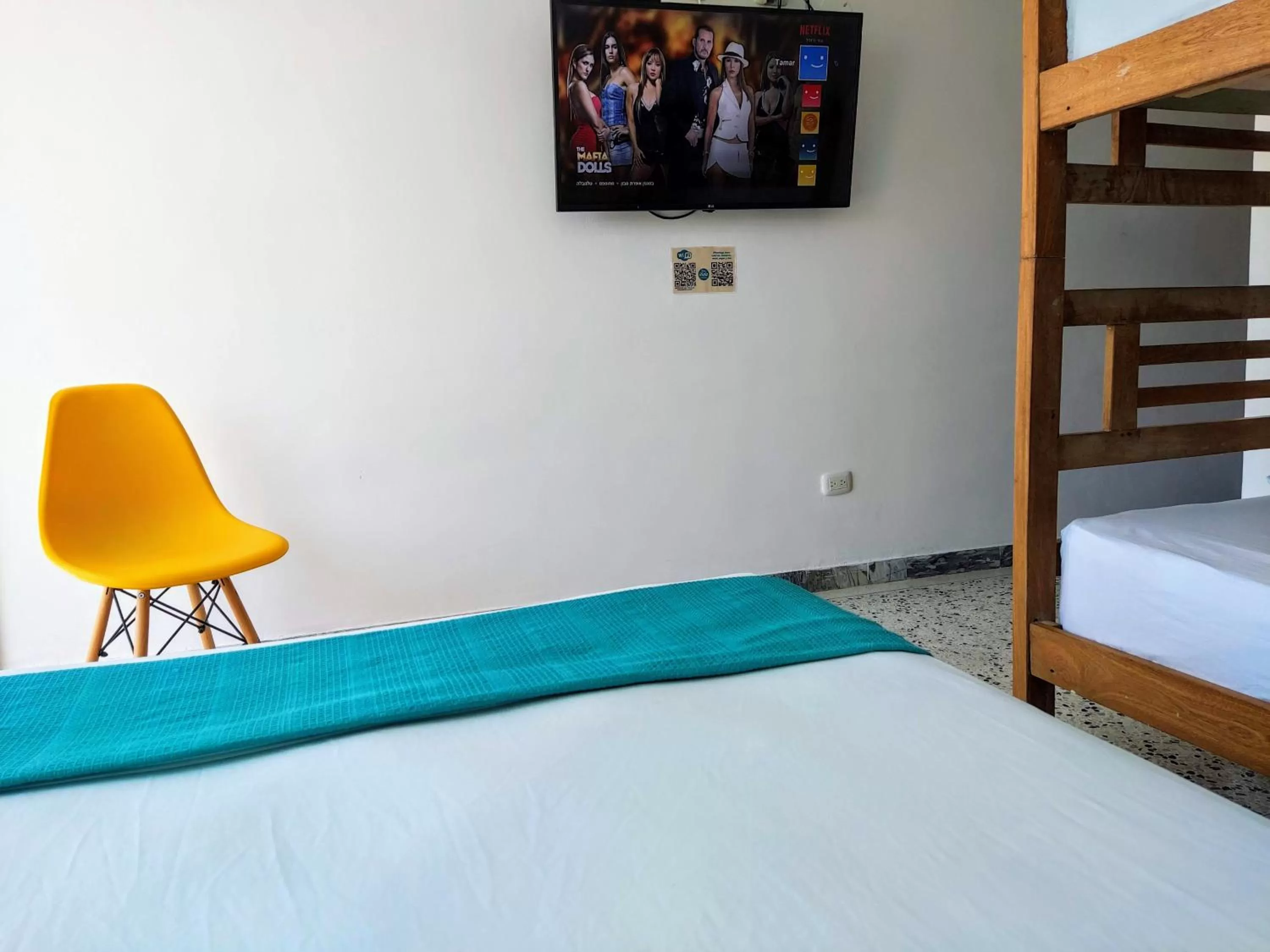 Bed in Bona Vida Hotel